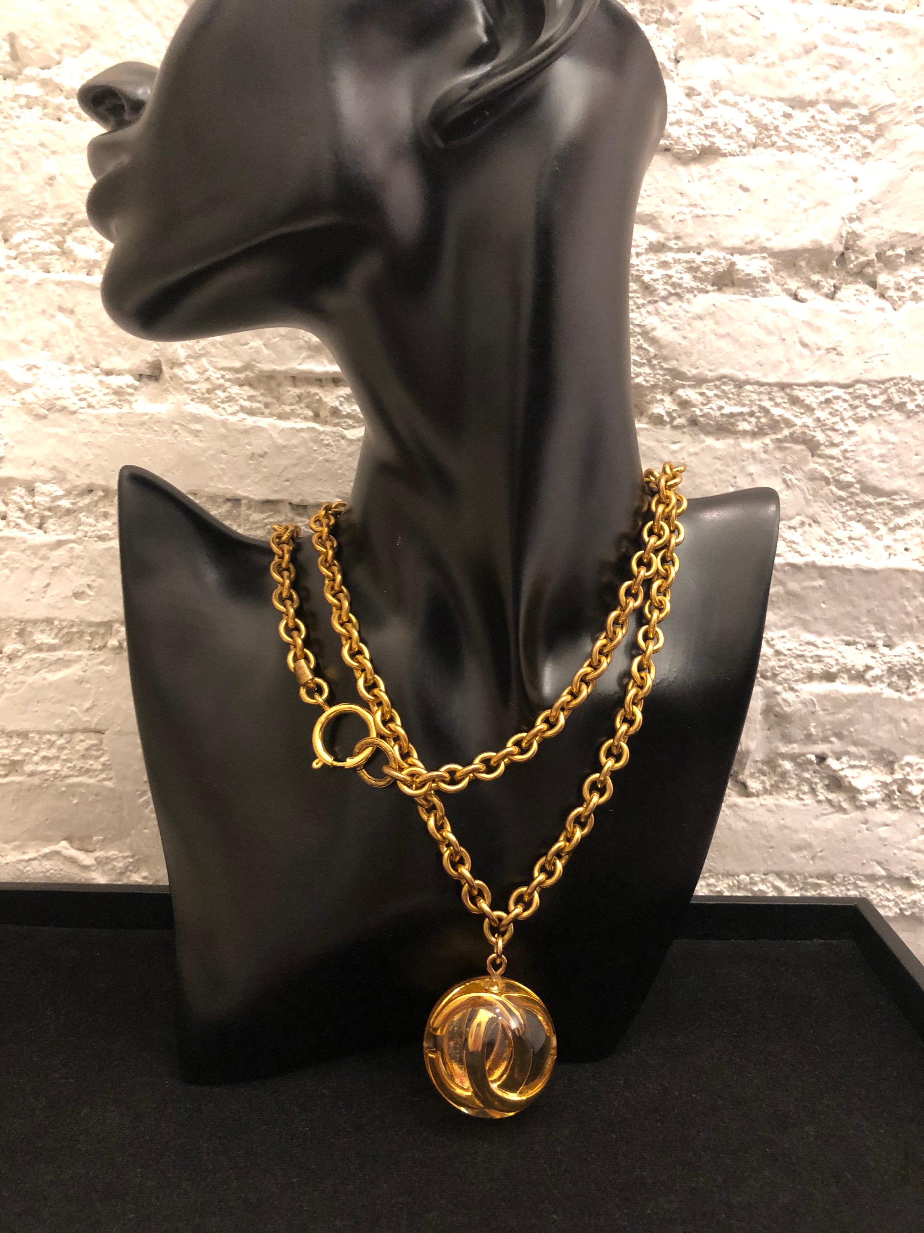 1980s Chanel Gold Toned Long Chain Necklace with CC Resin Ball Charm 4