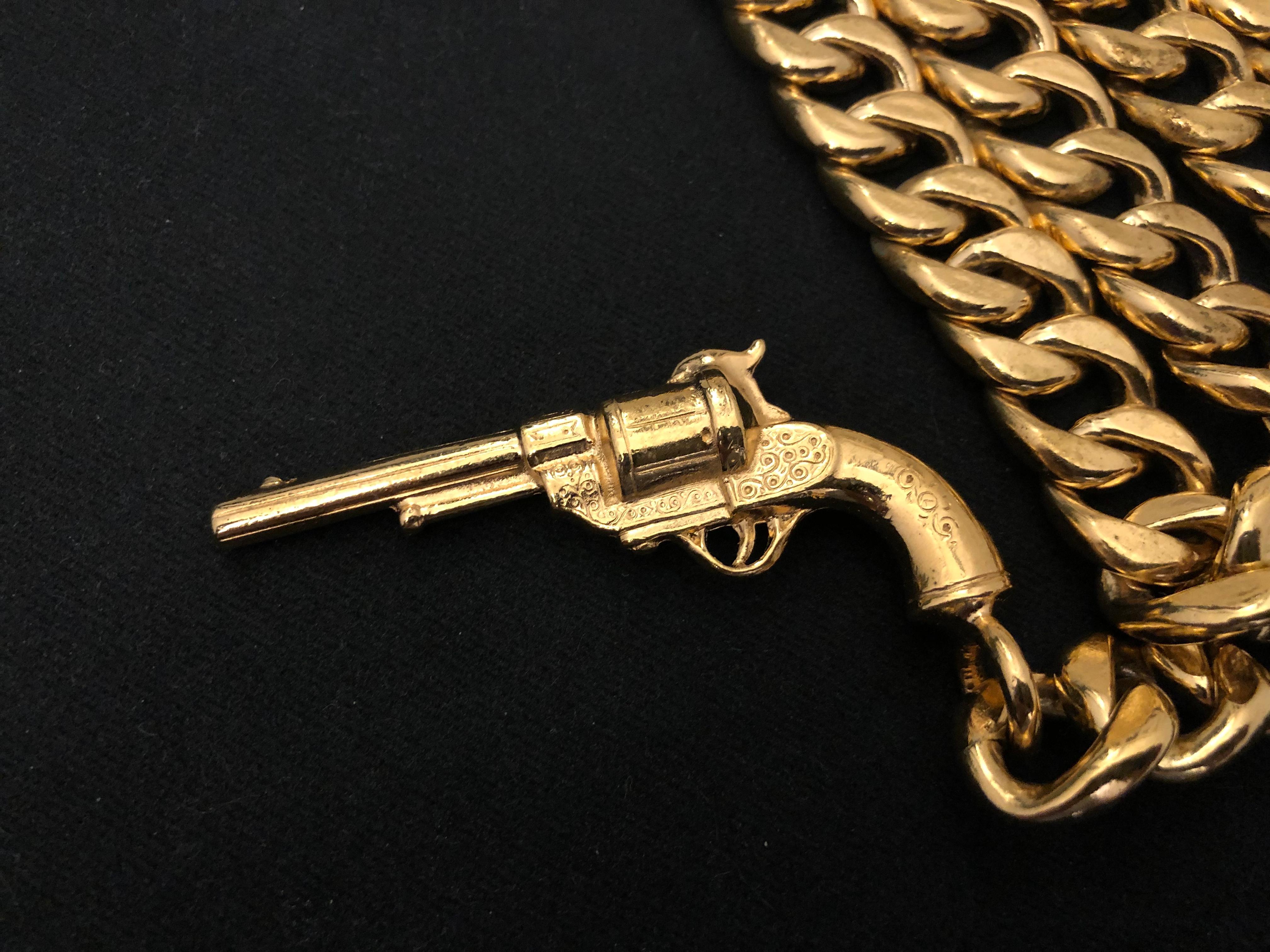 1980s Vintage CHANEL Gold Toned Pistol Gun Chain Necklace 1