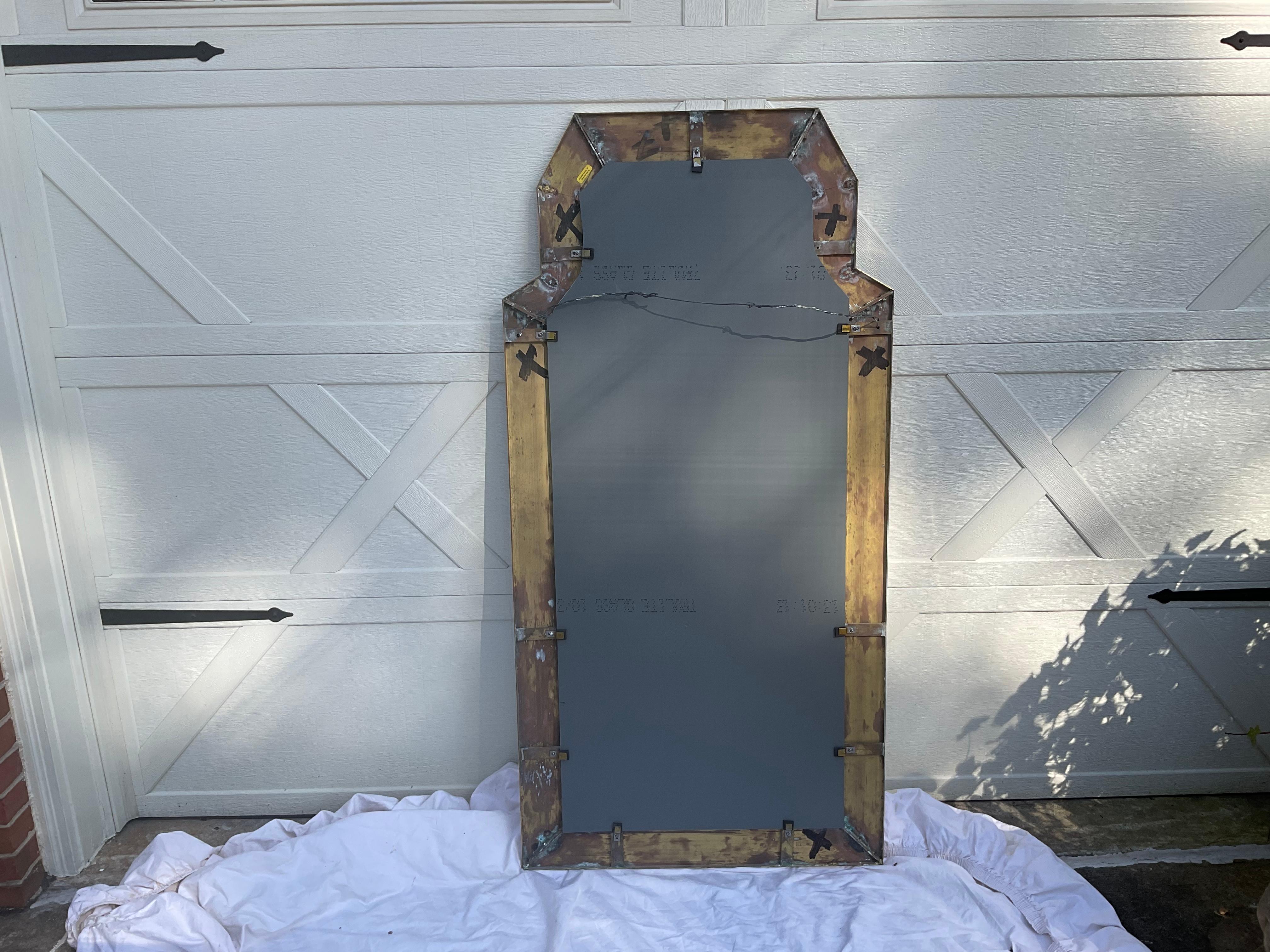 Haven’t seen this particular Chapman mirror before. ( I buy quite a lot of Chapman pieces). Large size, could be hung or used as a floor mirror. Wide, flat, brass frame surrounds a new mirror. Frame dates to 1981.( label).