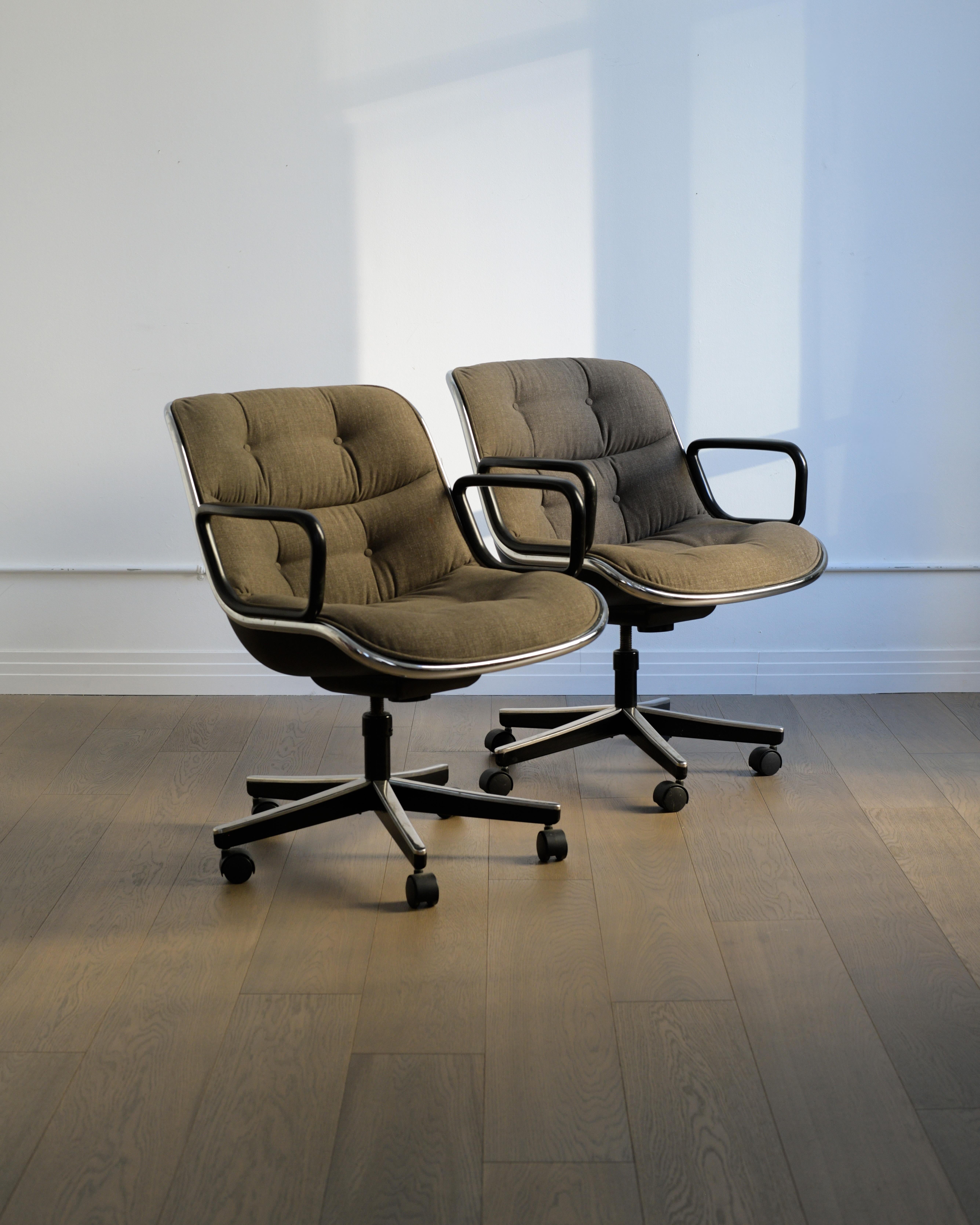 Pair of iconic 1980s Charles Pollock Executive Chairs by The Knoll Group in grey fabric. 

Pair is in really good vintage condition with very minimal signs of use - some very light scratching on shells and some small stains to fabric. Overall they