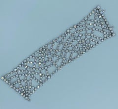 1980s Chaumet 18k gold and diamond cobweb bracelet in its original box