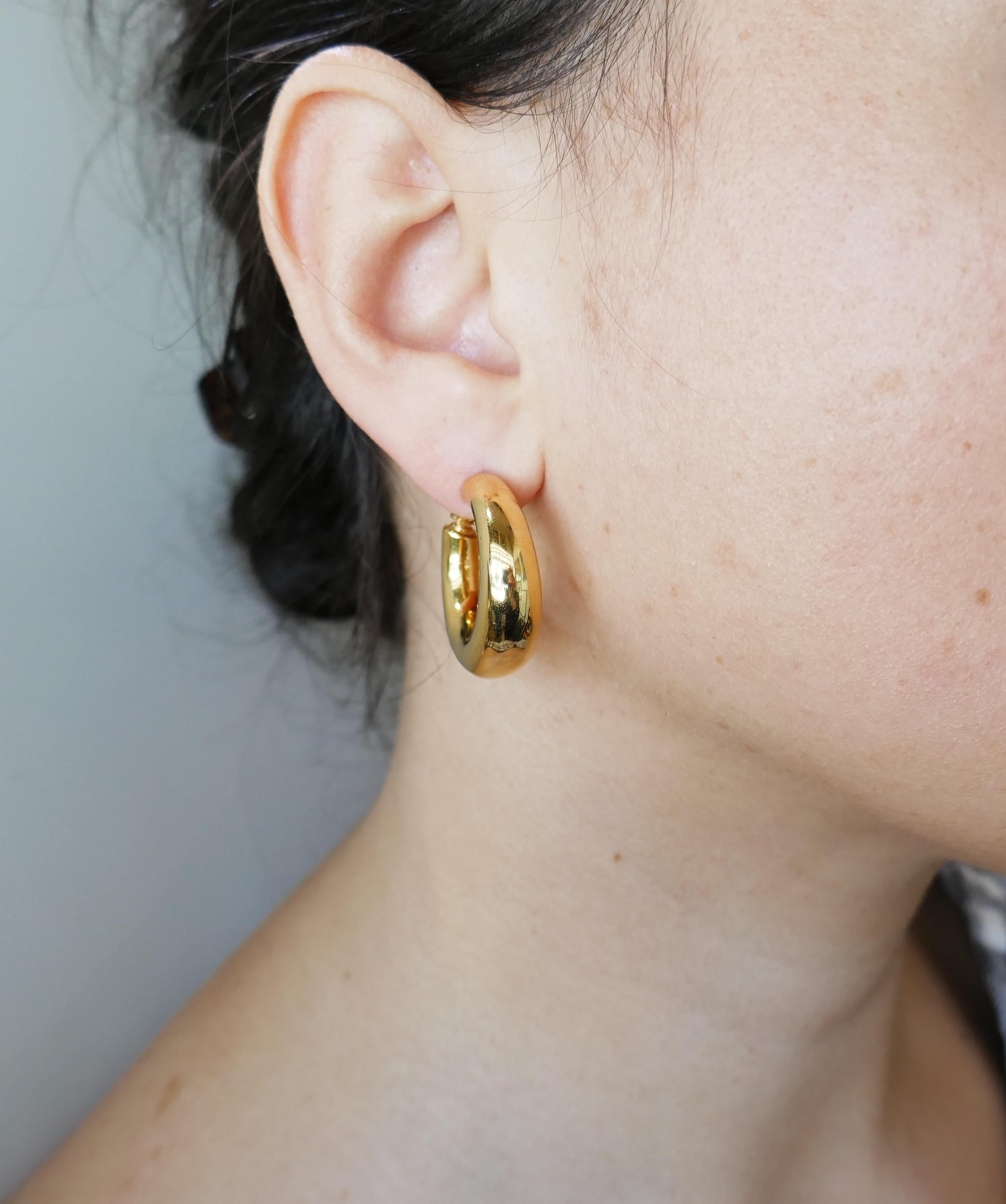 Lovely  hoop earrings created by Chaumet, Paris in the 1980s. 
Trendy, light, chic and wearable, the earrings are a great addition to your jewelry collection.
The earrings are made of 18 karat yellow gold. 
The hoops measure 1 x 5/16 inches (2.5 x