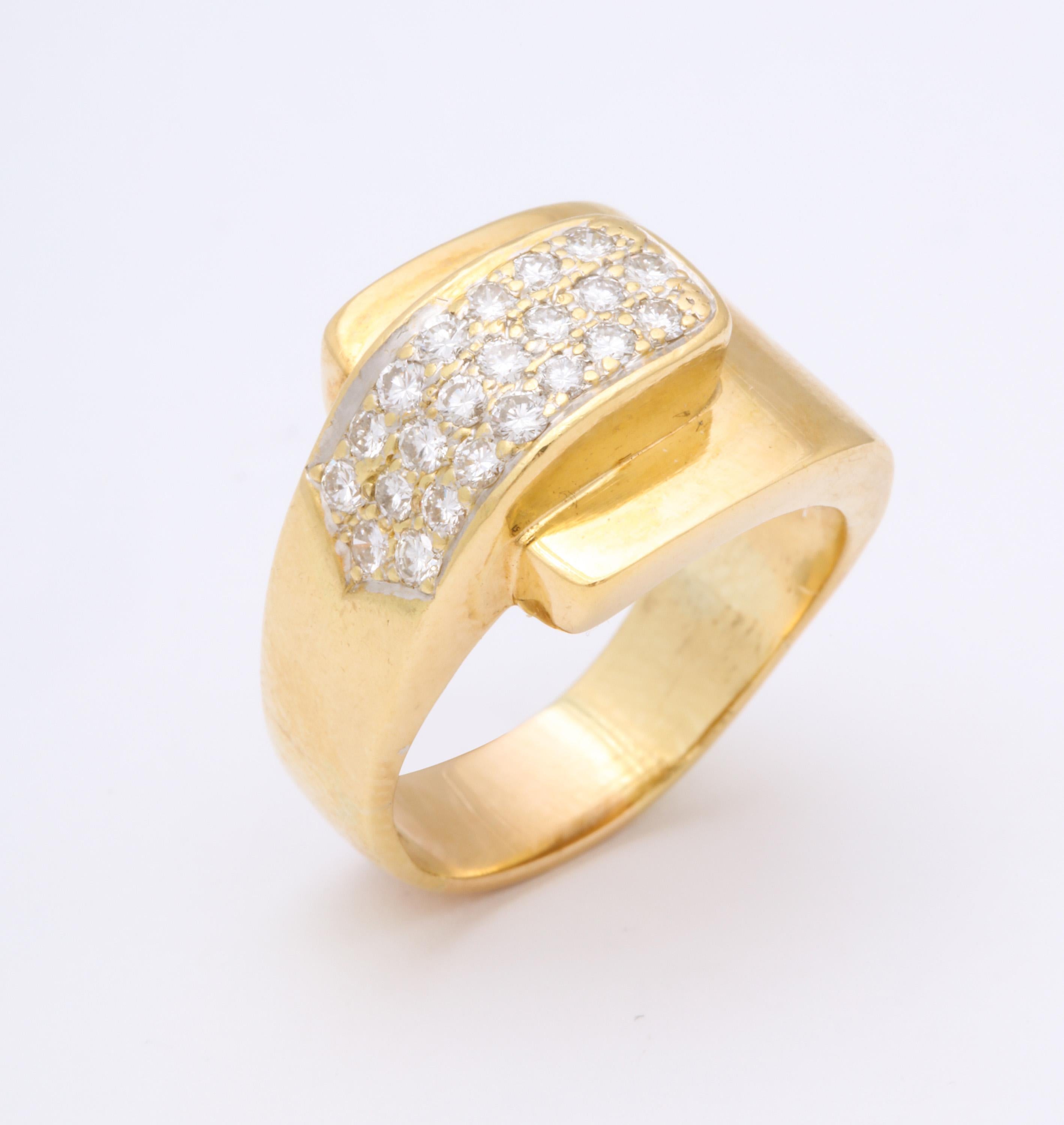 One 18kt High Polish Yellow Gold Buckle Design Ring Embellished With Approximately 1.50 Cts Of High Quality Brilliant Cut Diamonds. Created In The 1980's In Te United States Of America. Ring Size 8  May Be Easily Resized To any Size Required.