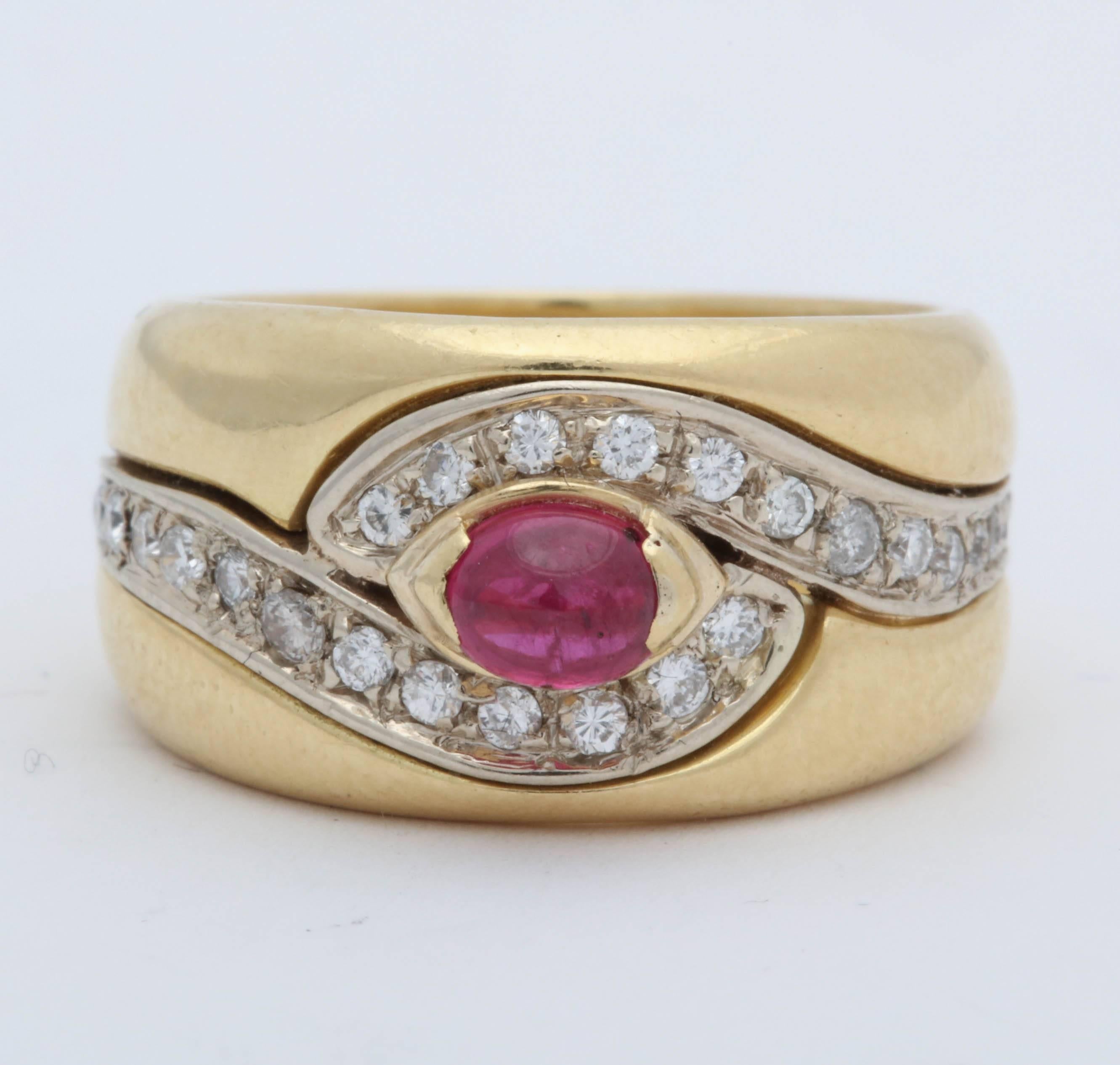 One Ladies 18kt Yellow Gold Band Style Ring Embellished With A >25 Ct Approximate Weight Cabochon Ruby. This Band Is further Designed With Numerous Full Cut Diamonds In A Swirl Type Pattern. Approximate Full Cut Diamond Weight = .90cts Total Weight.