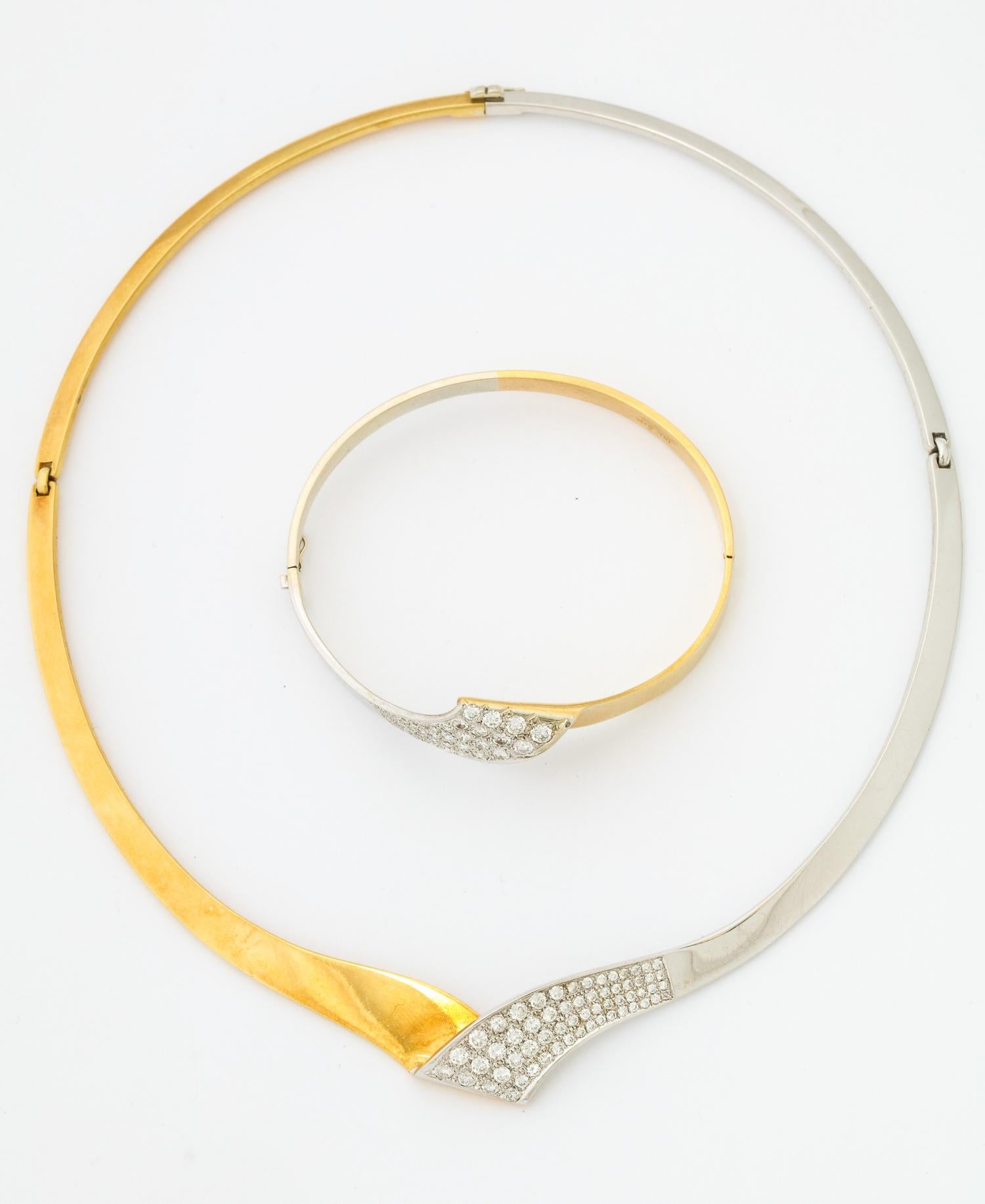 One Ladies Ultra Chic Collar Necklace With Matching Bangle Bracelet Crafted In White And Yellow 18kt Gold. Ensemble Is Embellished With Approximately 2.50 Cts Of Diamond Total Weight. All Diamonds Are Full Cut And Are Very High Quality.Created In