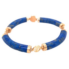 1980s Chinese Luck Symbol Lapis Lazuli Curved Link Bracelet in 14 Karat Gold