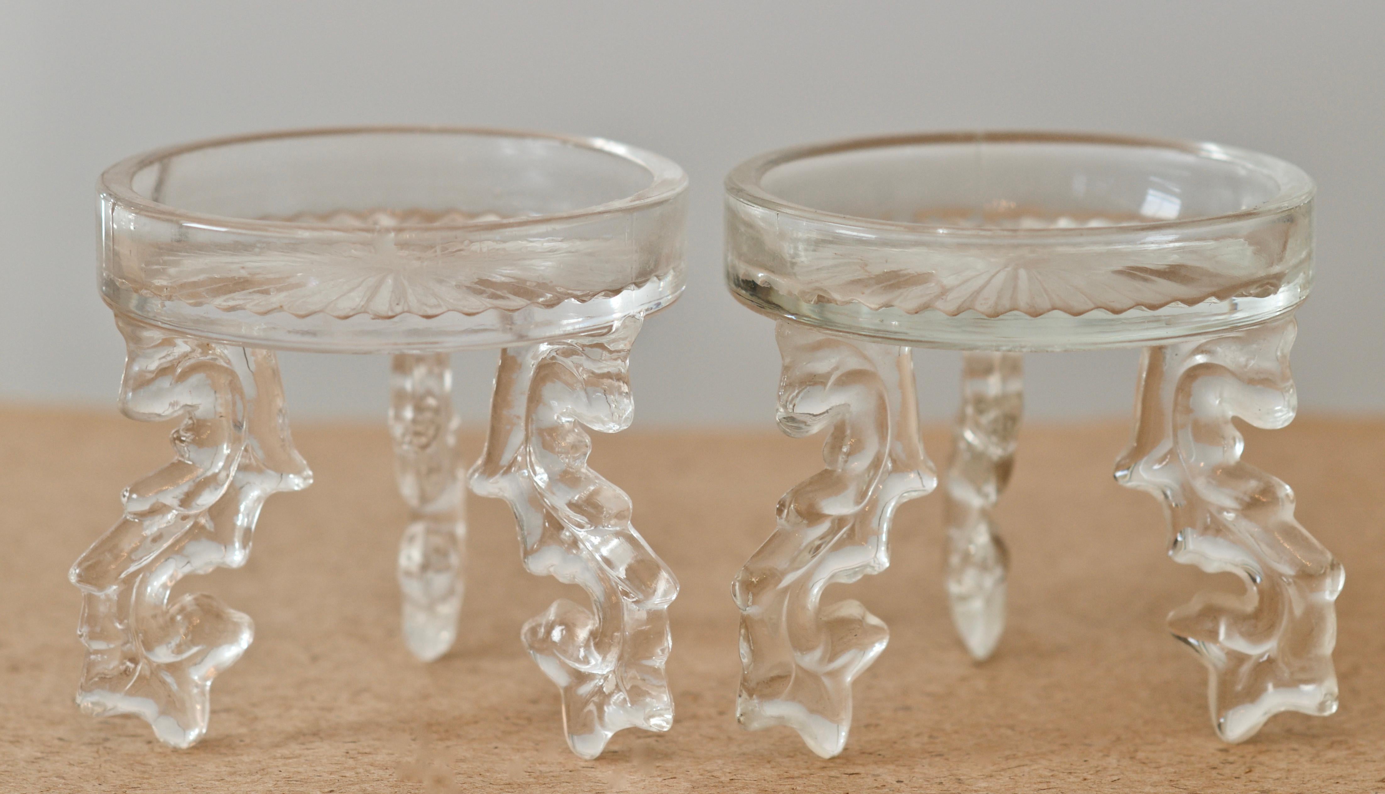 Pair of simple yet beautifully elegant chinoiserie glass pillar candle holders. Measures 3.75