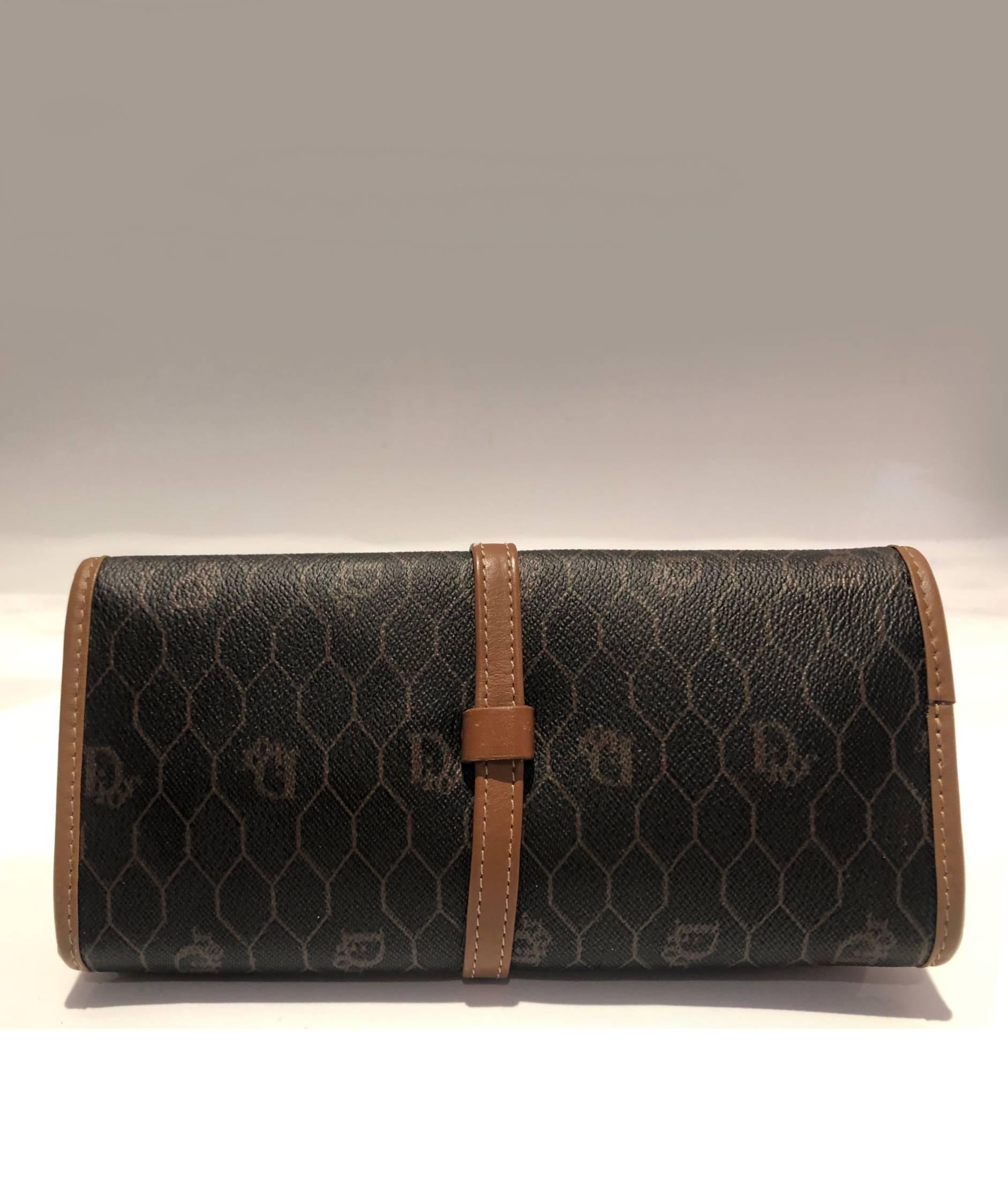 Christian Dior brown leather monogram jewellery wrap that can also be carried as a handbag, 5 different zipped compartments for your jewelry, coins, cards and notes. Interior in beautiful soft beige suede, all zips are perfectly working and in