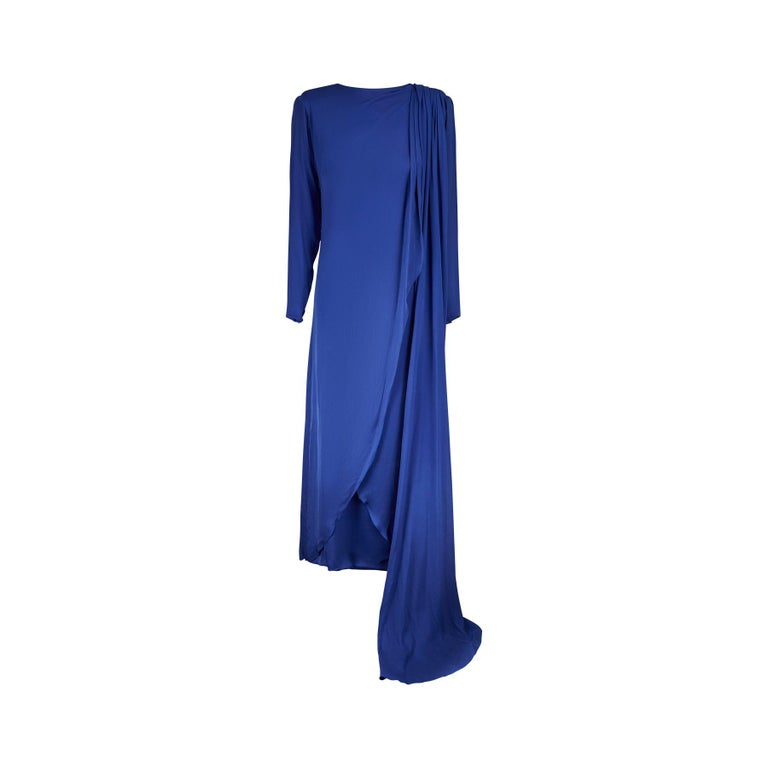 This 1980s French demi couture column dress is composed of swathes of blue chiffon silk, brought together with numerous haute couture stitching. It was purchased as a Dior and certainly has all the whole marks of high-end Dior boutique construction