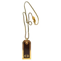 1980er Christian Dior emaillierte Logo-Anhänger-Halskette mit Anhänger