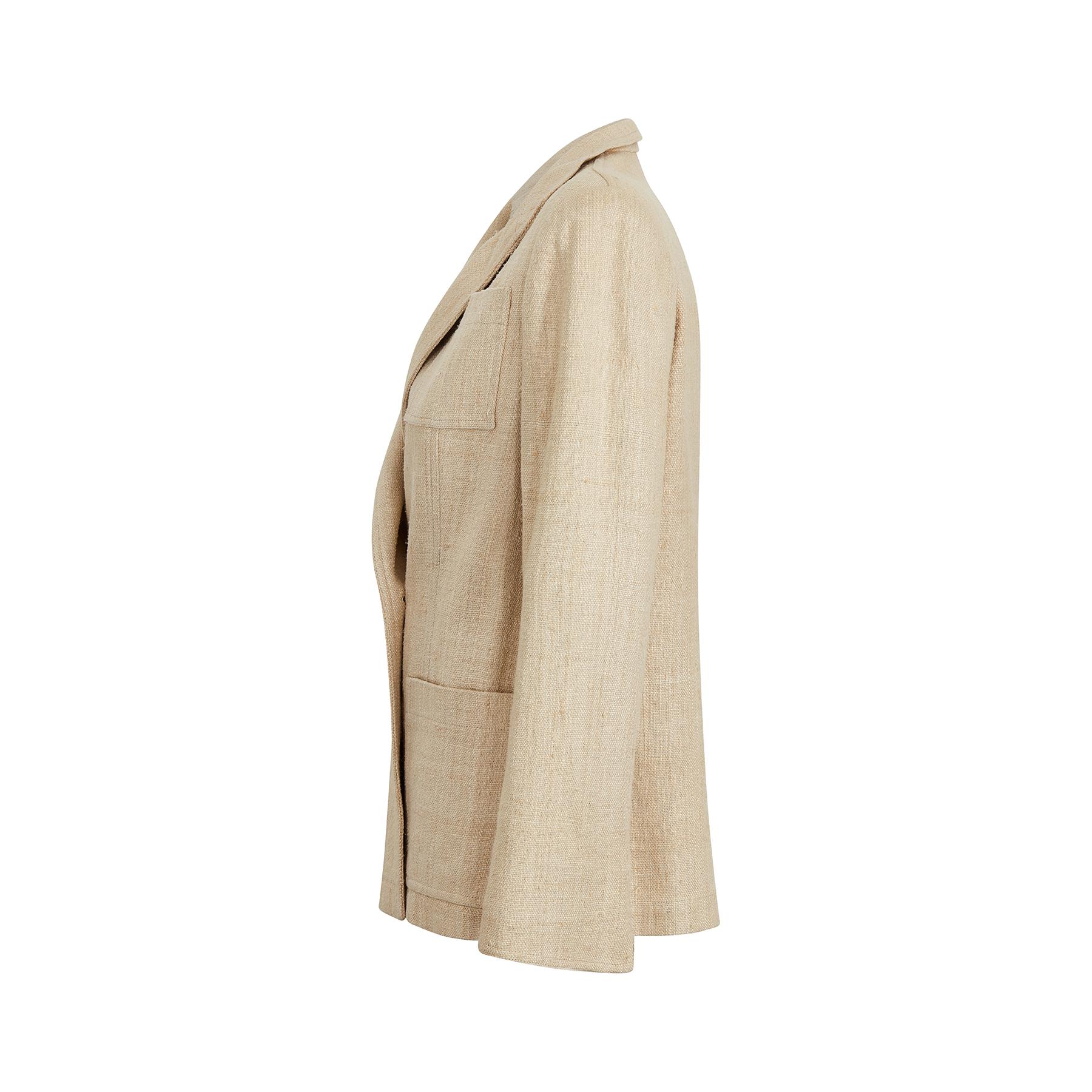 Christian Dior Boutique oatmeal silk blazer jacket. This is a really good example of the double-breasted sports jackets that were fashionable in the late 1980s and early 1990s and it's a timeless style. It is made from the finest quality