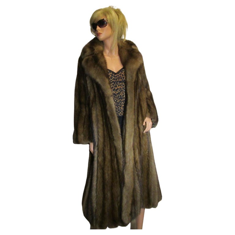 Gorgeous 1980s Christian Dior Russian Sable Fur Coat with the authentic label of: ChristianDiorFurs
This is an incredible and rare piece of Dior's history in the fur market.  This coat was made in the 1980s and this time period was known as the