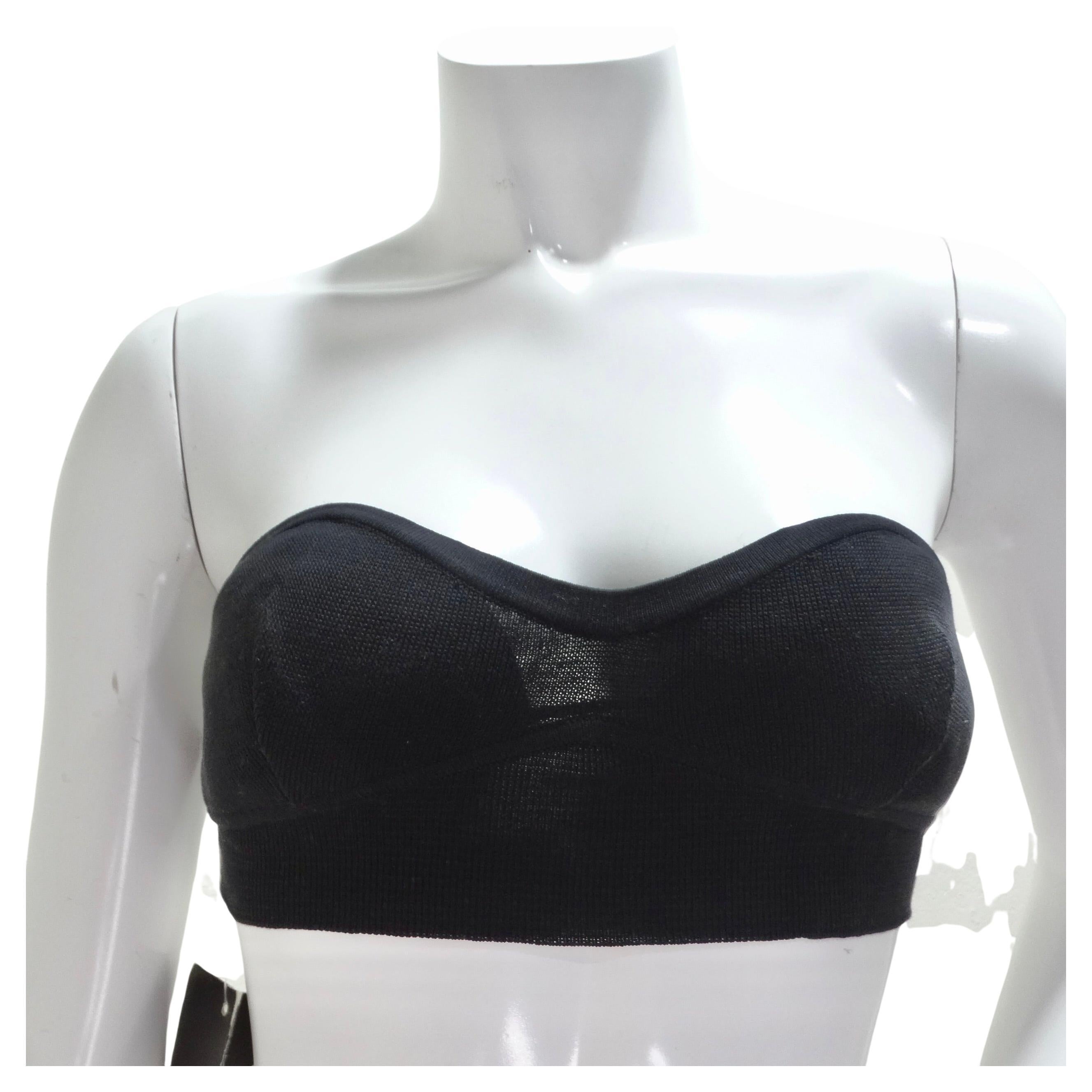 Step into the world of vintage elegance with this Claude Montana 1980s Black Classic Bandeau Bra. Crafted with impeccable attention to detail, this strapless bandeau exudes sophistication and timeless charm. Indulge in the flattering fit of this