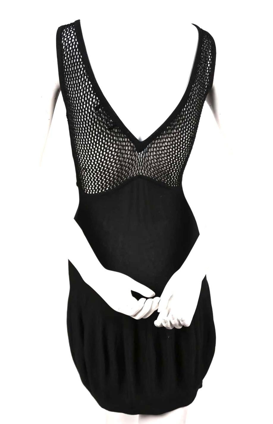 1980's CLAUDE MONTANA black knit dress with bubble hemline and open knit back In Good Condition For Sale In San Fransisco, CA