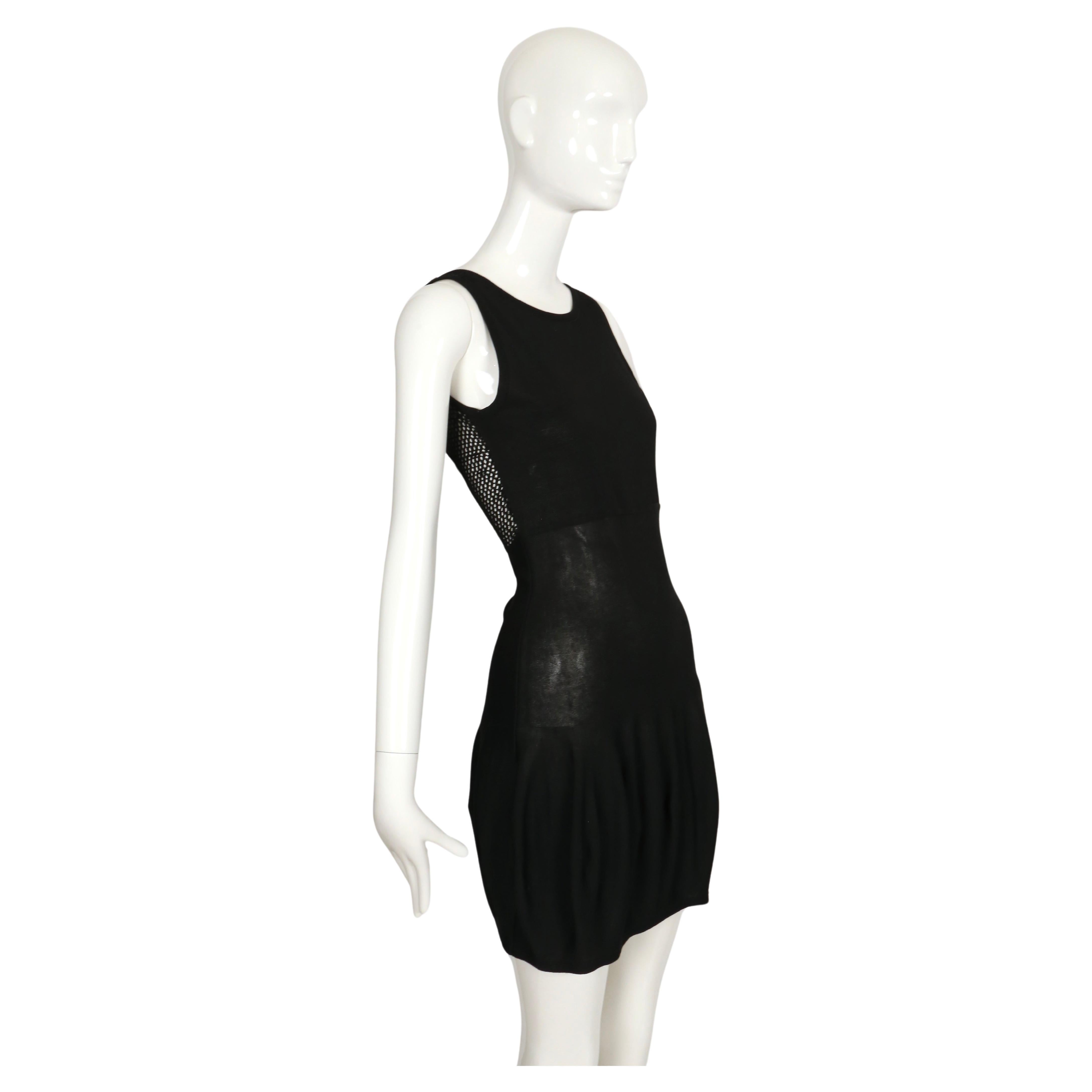 Women's or Men's 1980's CLAUDE MONTANA black knit dress with fishnet back For Sale