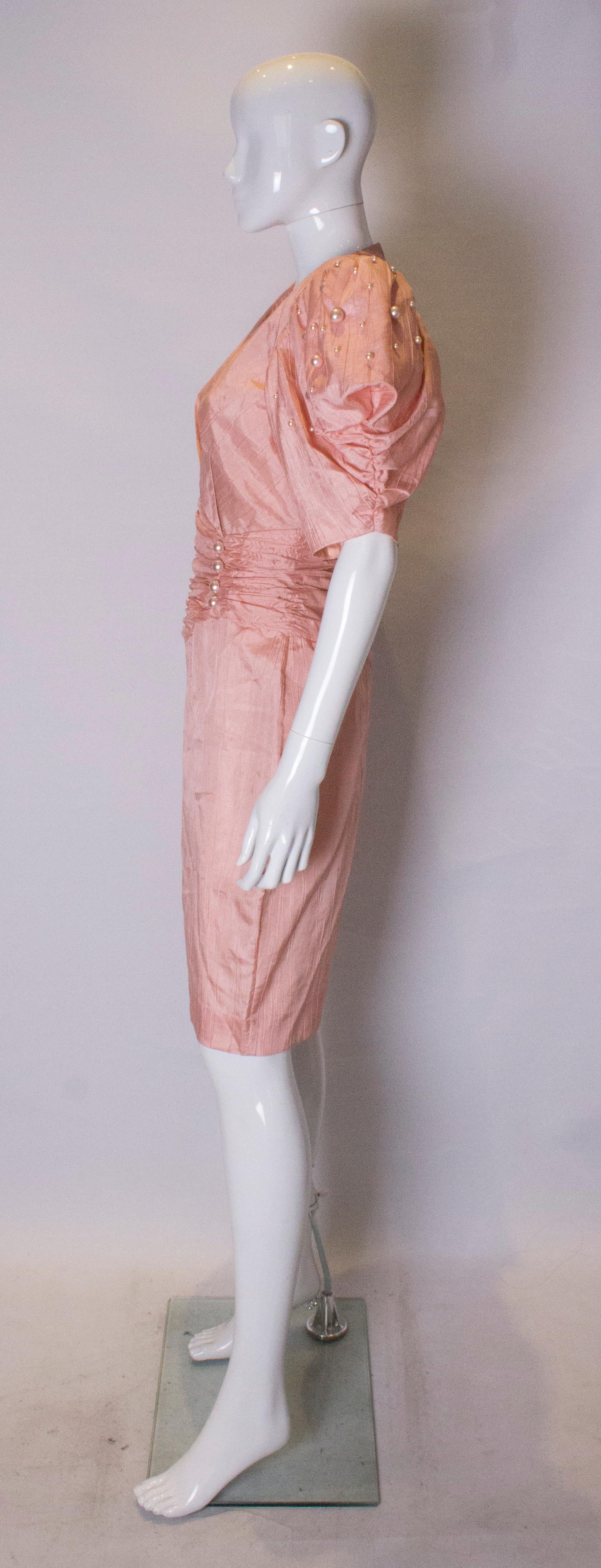 1980s Cocktail Dress in Powder Pink with Pearl Decoration. In Good Condition For Sale In London, GB