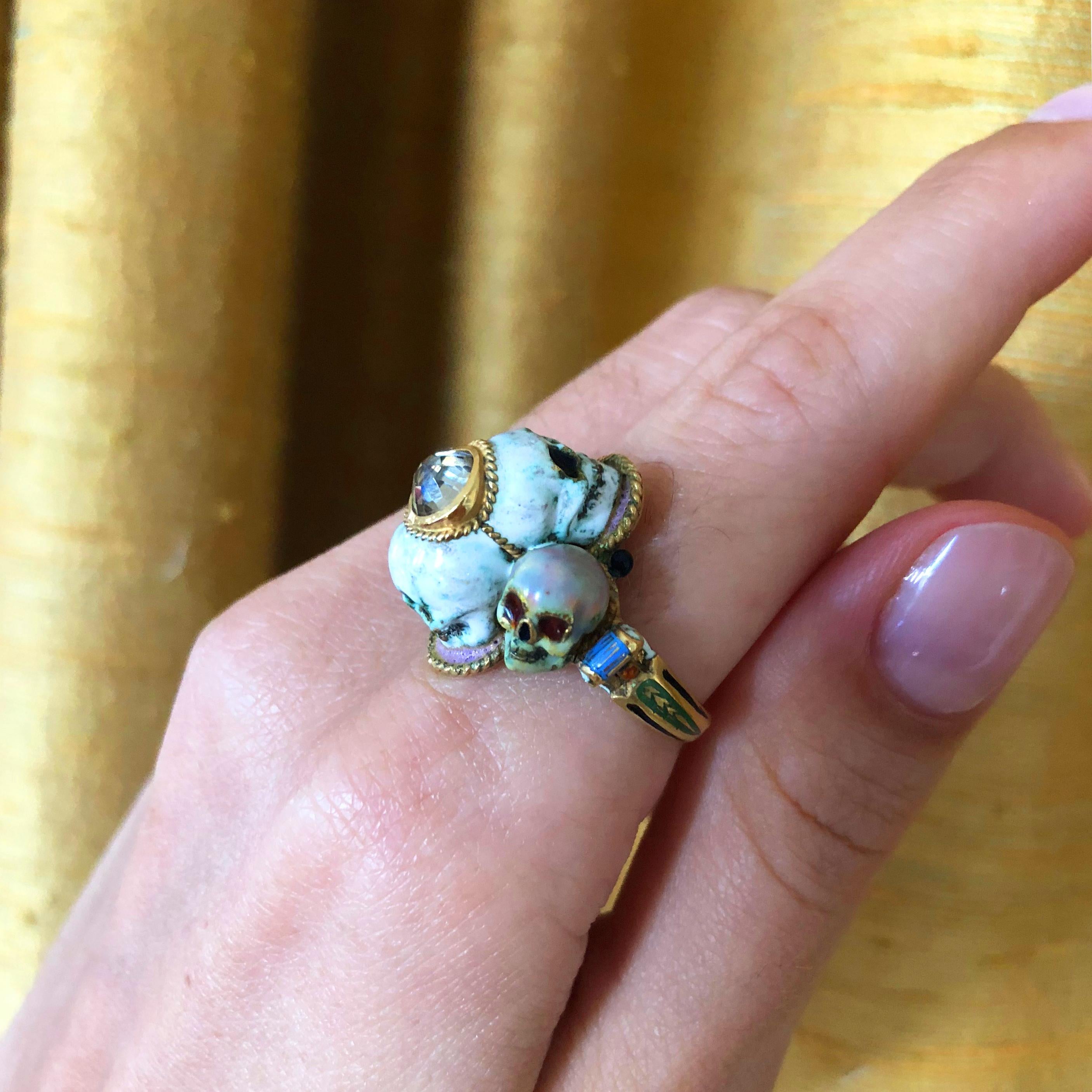 A diamond, enamel, and 18 karat gold skull ring, by Venice-based house of Codognato, 1980s. This ring is a size 9. It is signed Codognato Venezia and stamped 18k - and part of the jeweler's famed skull collections.