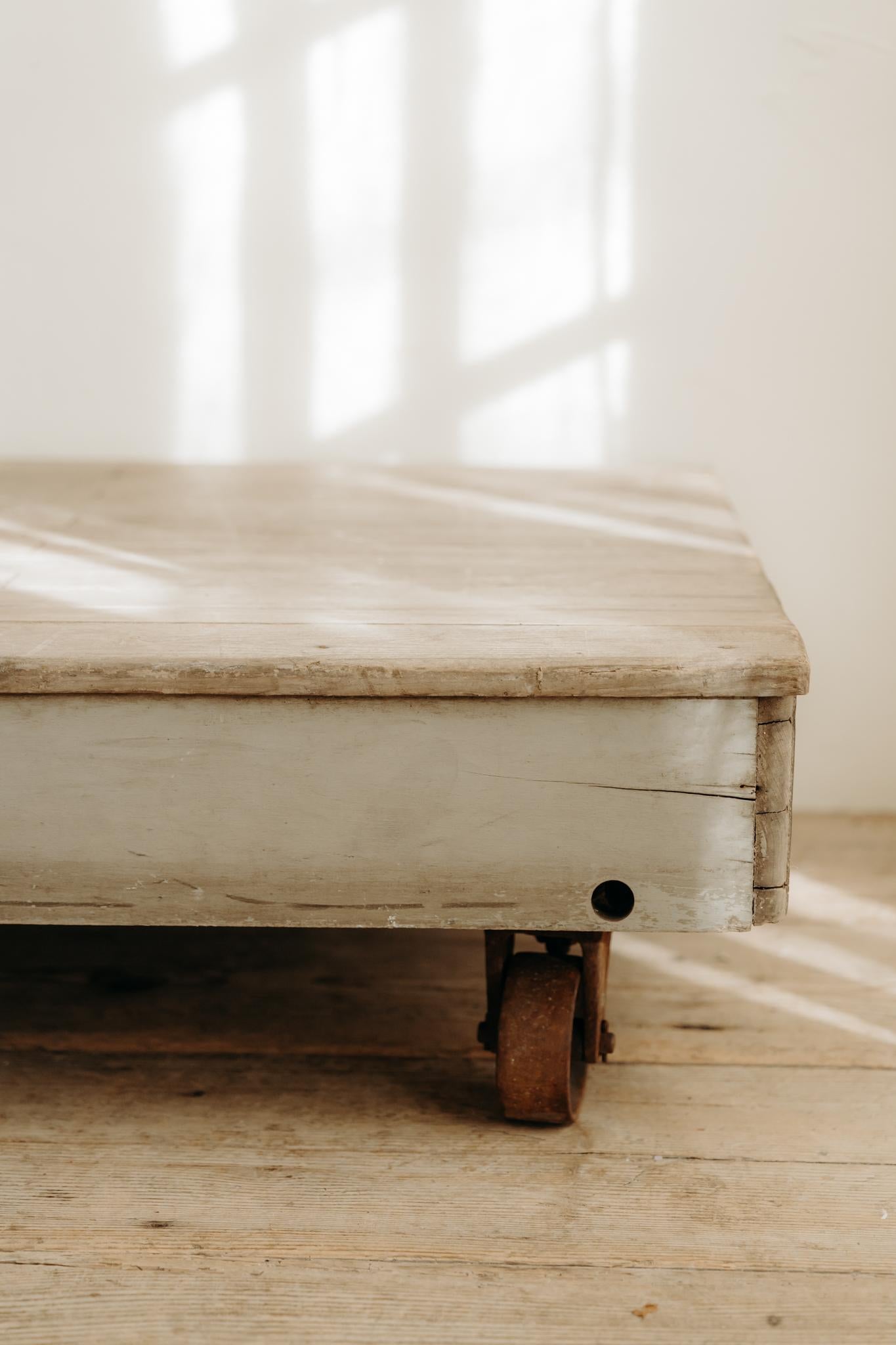 price is for one coffee table, but as you can see on the pictures I have two of these available, made in the 1980's for a loft in the city of Antwerp, owned by a couple of architects, tables are made from antique pine wood, grey paint. 
