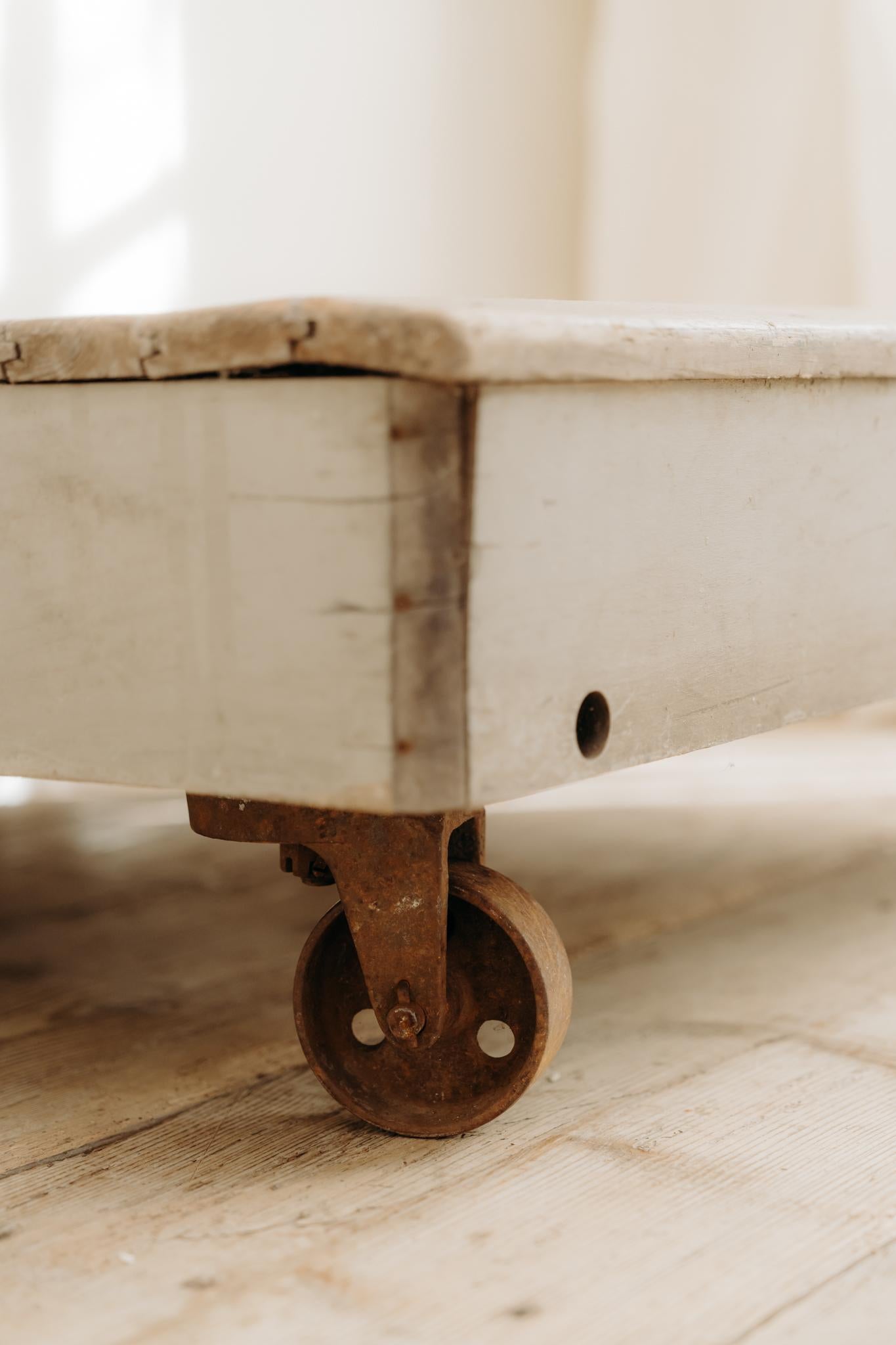 Belgian 1980's coffee table on wheels For Sale