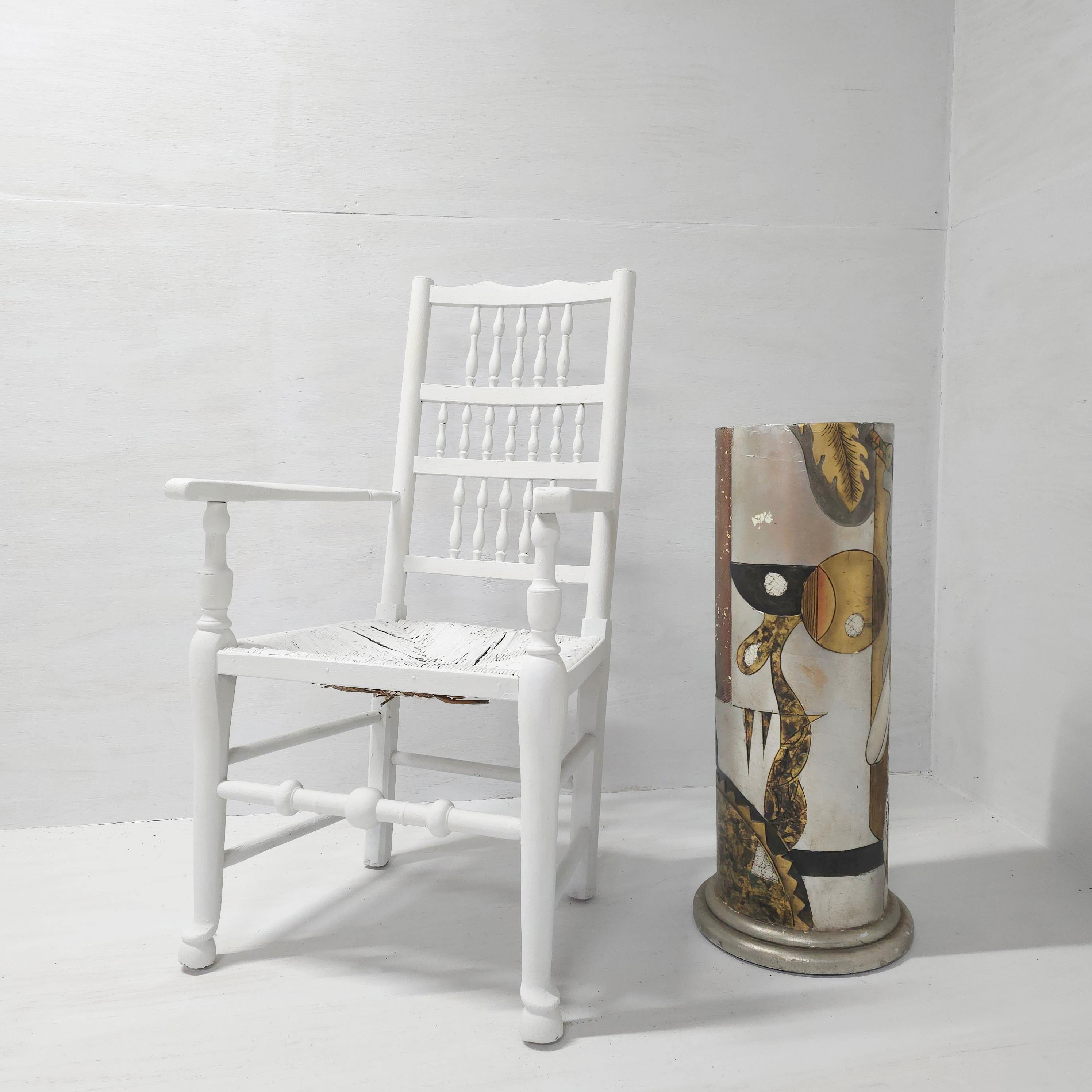This 1980s pedestal column is like the entirety of the decade condensed and compressed into this solitary form. The Memphis slash Art Deco-ish aesthetic is brilliantly eccentric. The palate of metallic paints: platinum, gold, and copper defined the
