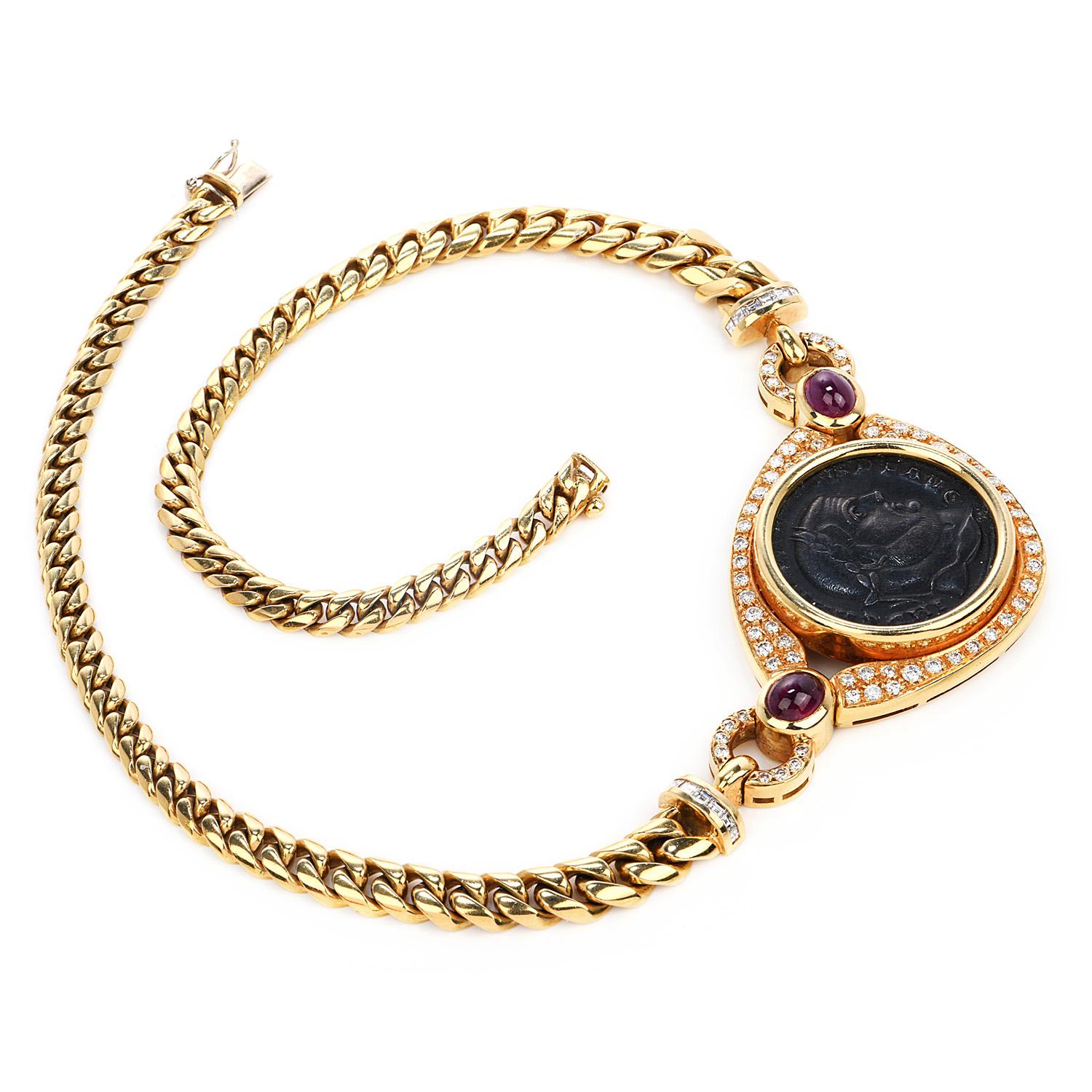 This  1980's solid 18k gold and diamond ruby Corinth pendant necklace with heavy solid 18k yellow gold curb-link chain is in excellent condition. This vintage coin is bezel set in an 18k yellow gold bezel surrounded by 1.50 carats of the round