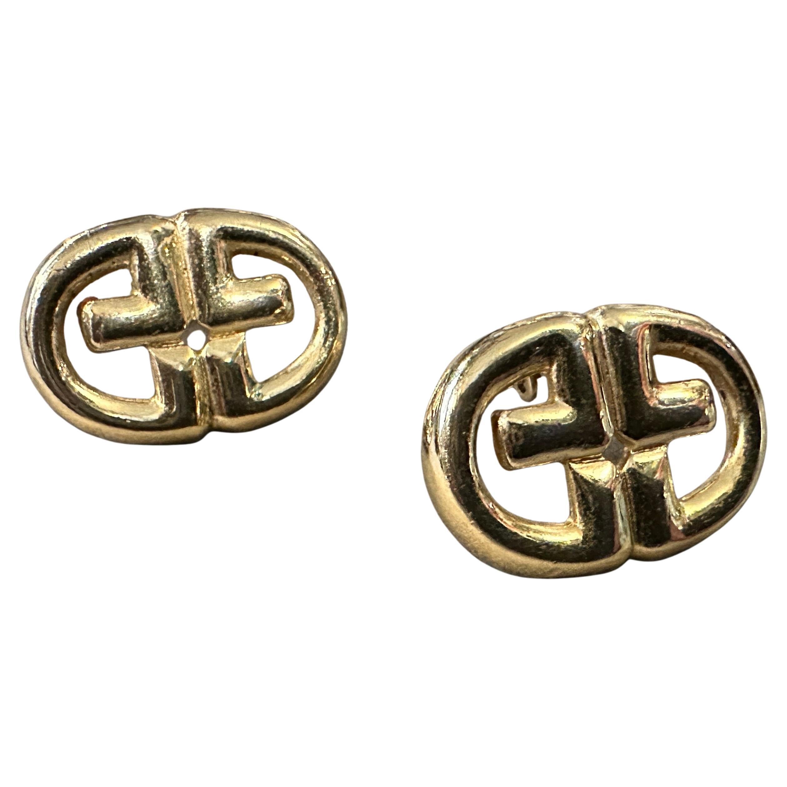 Orecchini di bigiotteria anni '80 in metallo dorato con logo di Givenchy