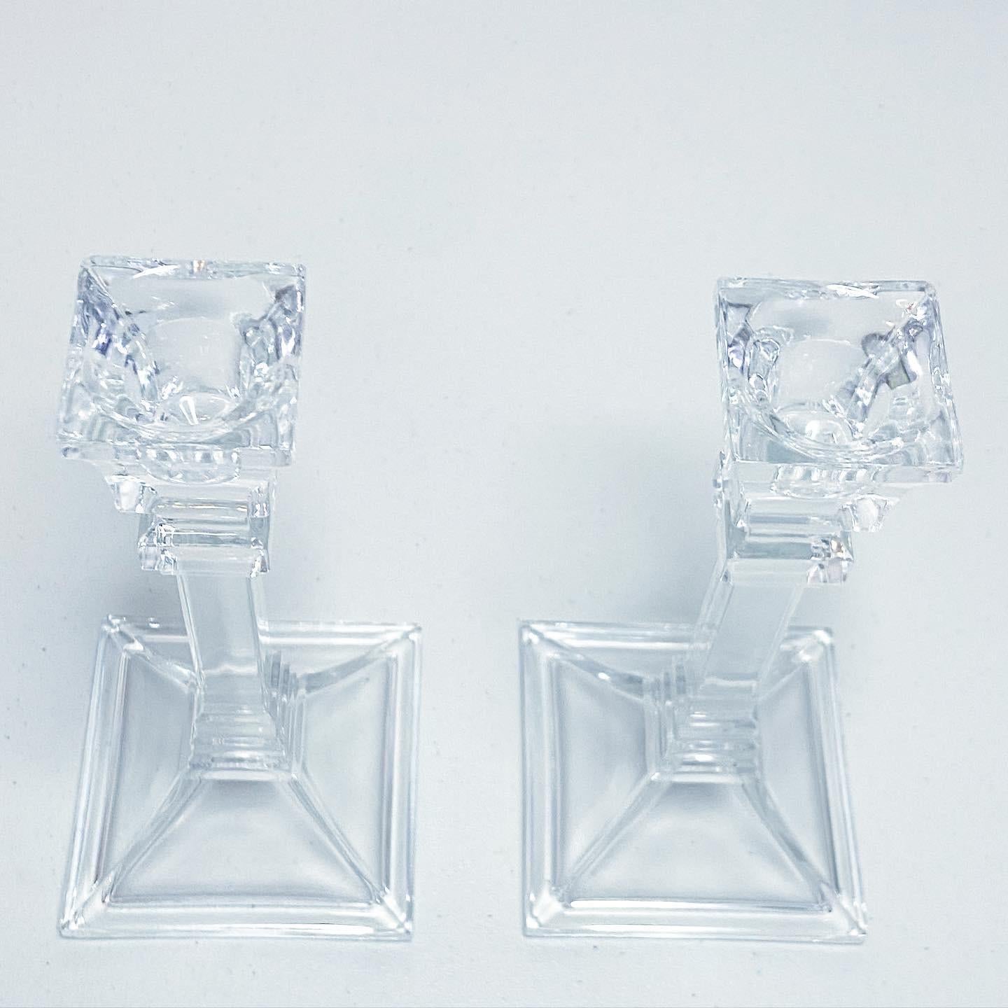 Incredible pair of crystal clear glass candle holders.
