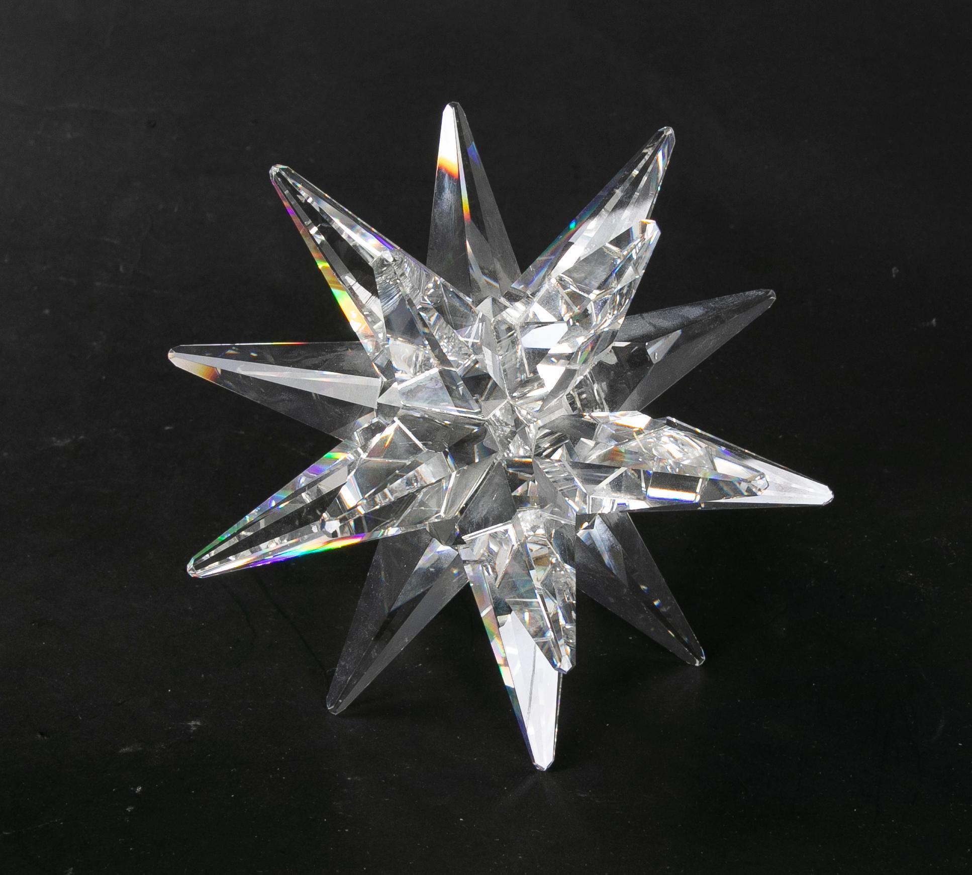 Papierbeschwerer aus Kristall aus den 1980er Jahren in Form eines Sterns.