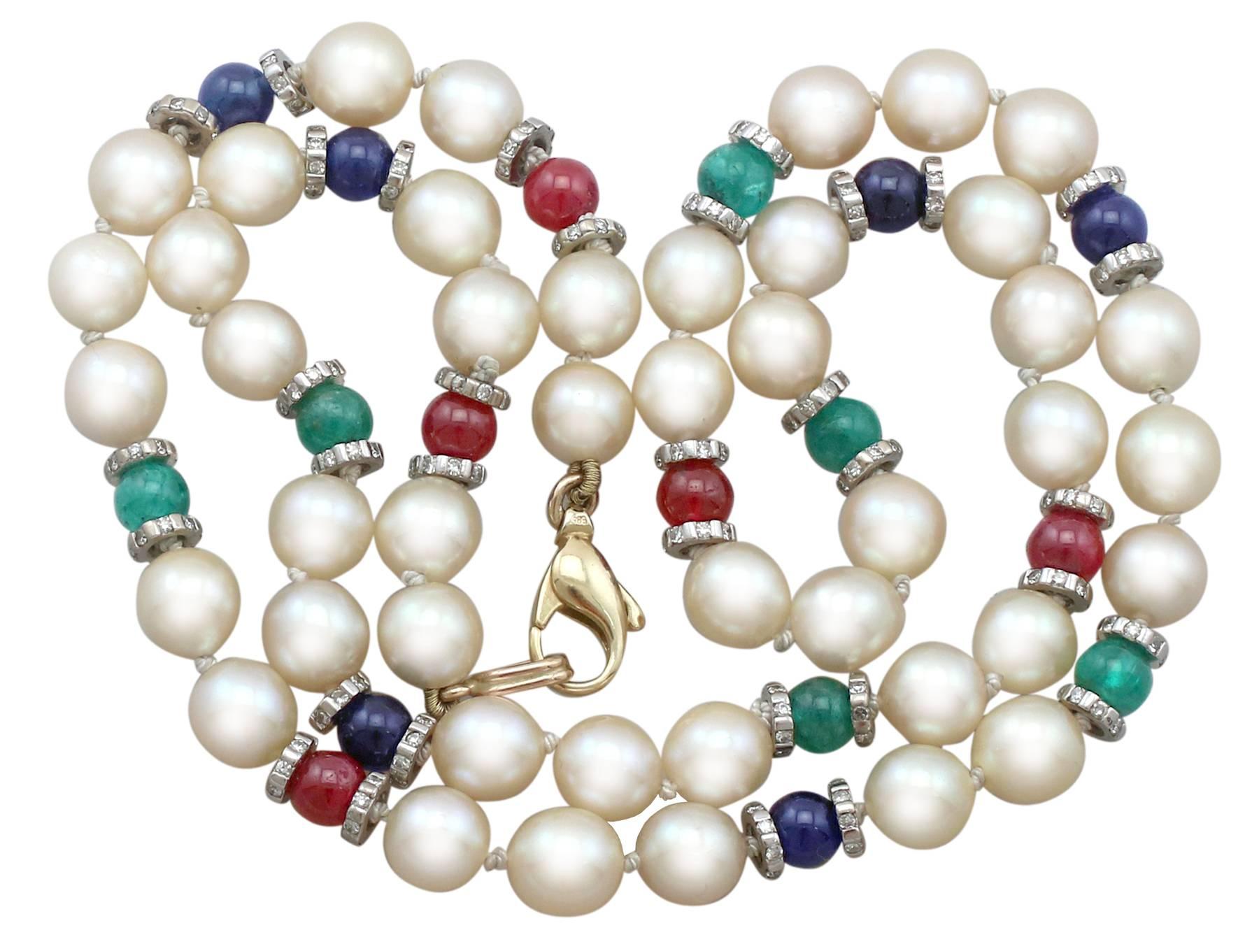 An impressive cultured pearl, 1.66Ct diamond, 8.20Ct sapphire, 7.38 Ct emerald, 7.25Ct ruby and 14k gold necklace; part of our diverse gemstone jewelry collections.

This fine and impressive pearl necklace is composed of forty-four individually