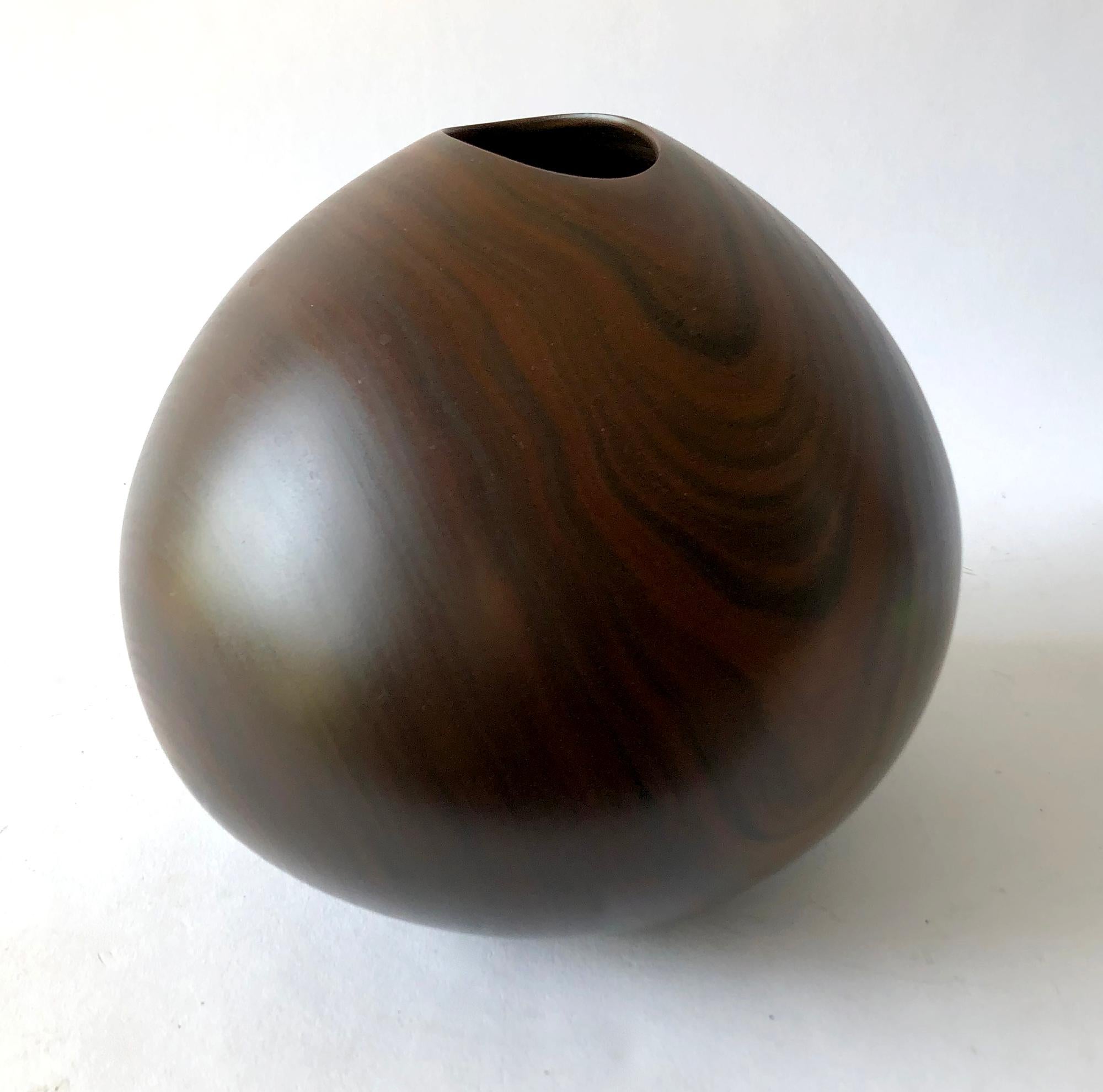 Vera wood vase created by Dan Kvitka of Portland, Oregon, circa 1980s. Vase measures 7