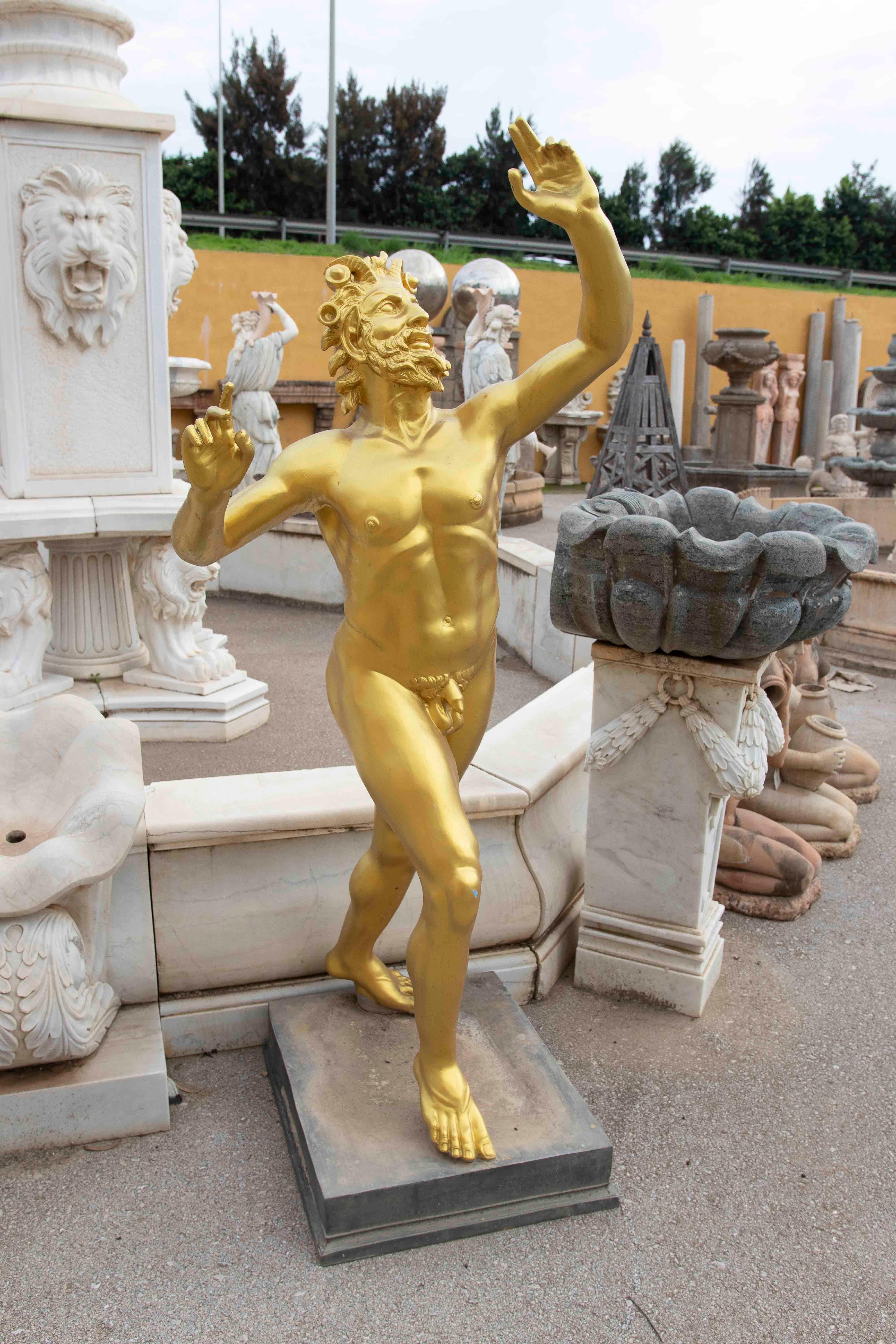 This vibrant sculpture depicts a dancing satyr, a mythological figure associated with joy, music, and hedonism. Its gilded finish highlights the anatomical and facial details, exuding dynamic and celebratory energy. The satyr’s theatrical and