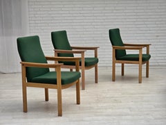 1980s, Danish armchair by Høng Stole, green furniture wool, oak wood.
