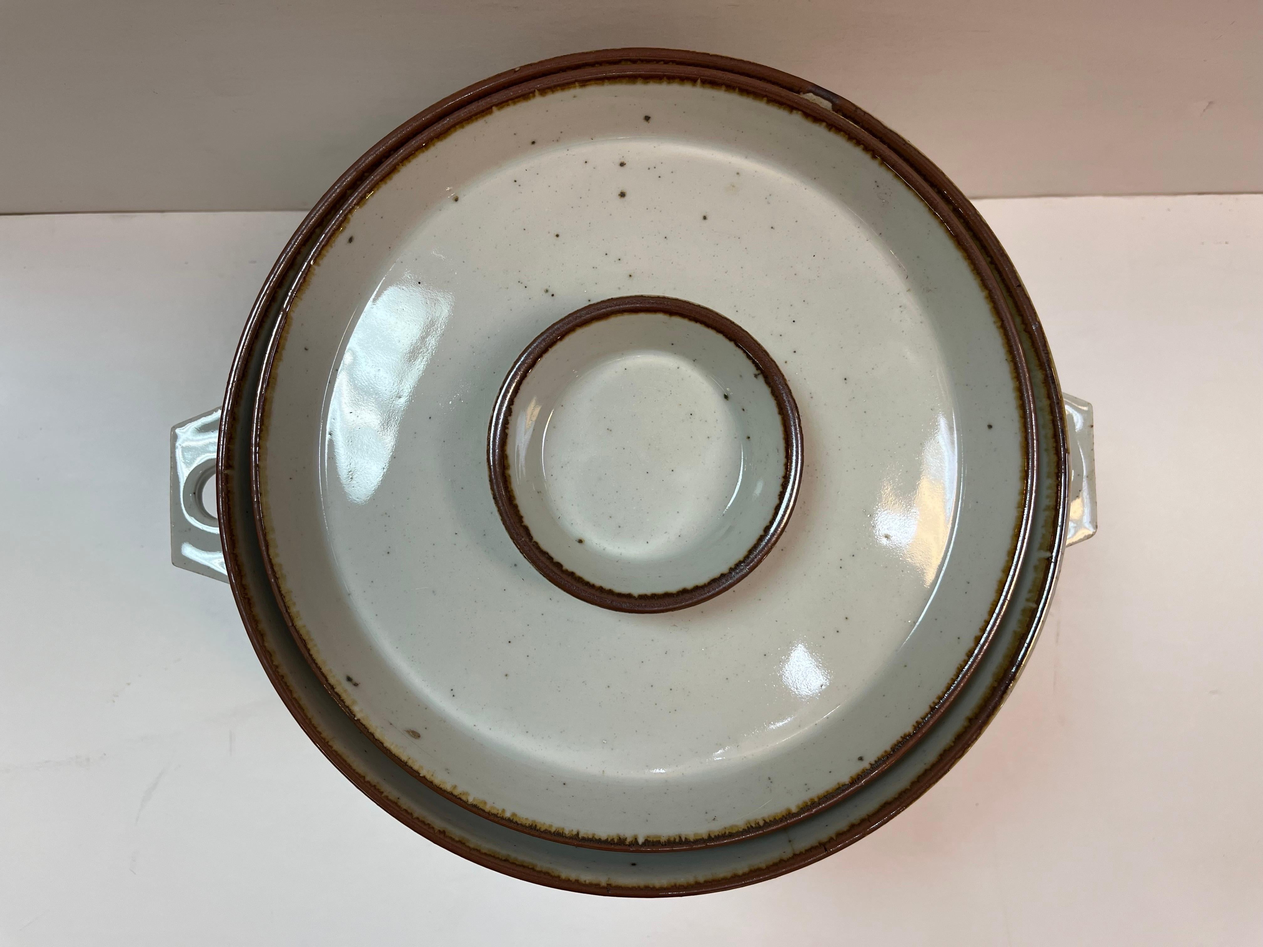 A vintage lidded casserole serving dish in Brown Mist by Niels Refsgaard for Dansk. You may know Dansk, if not don't worry I'll get to them later. For now, let's look at who Niels Refsgaard is. From a Dansk catalog, 