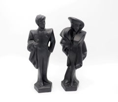 1980s decorative art deco couple dressed in gala clothes