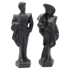 Vintage 1980s decorative art deco couple dressed in gala clothes