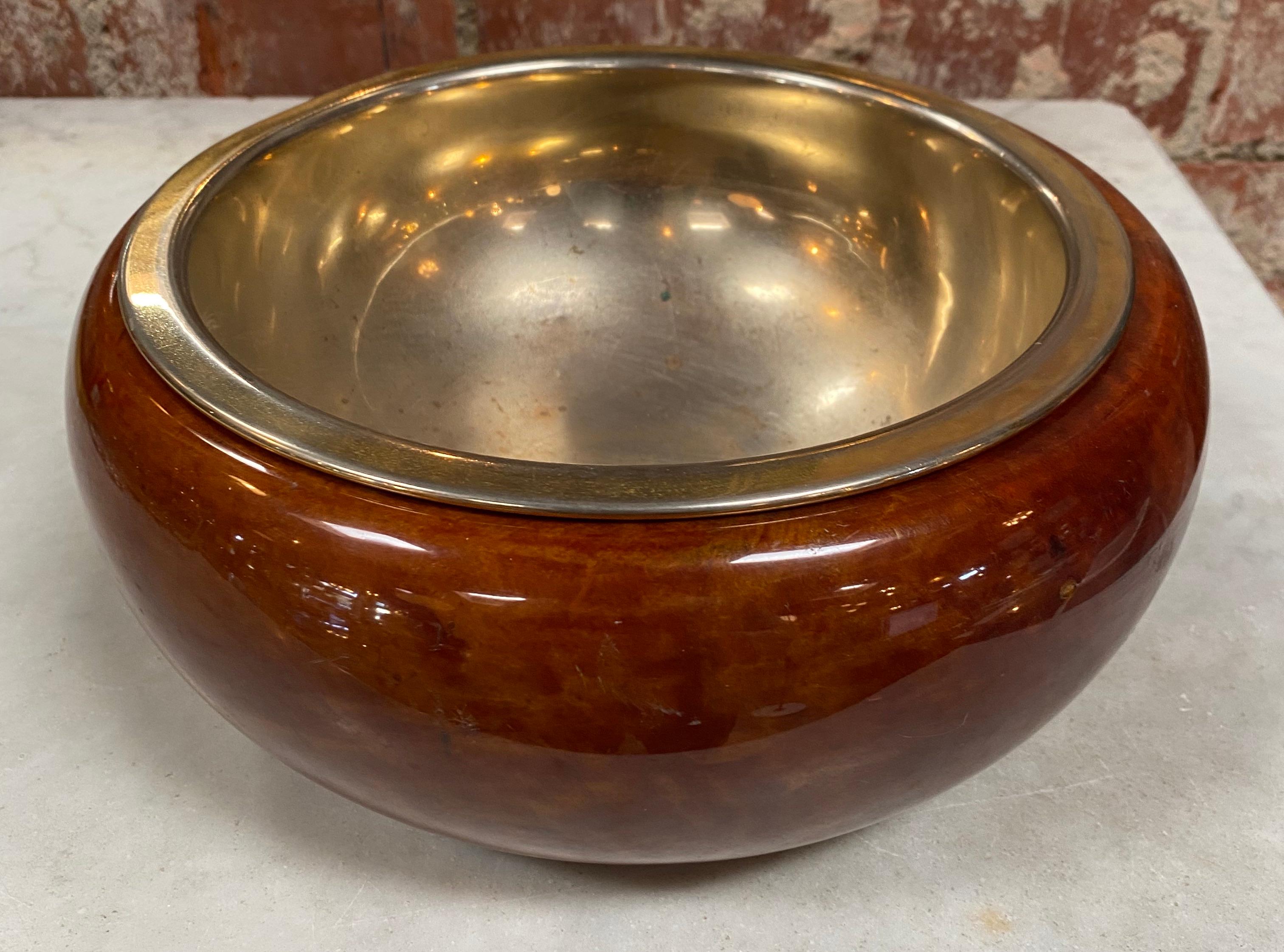 Italian decorative center bowl made with brass and wood.