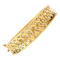 1980s Diamond 18 Karat Yellow Gold Round Cut Bangle Bracelet