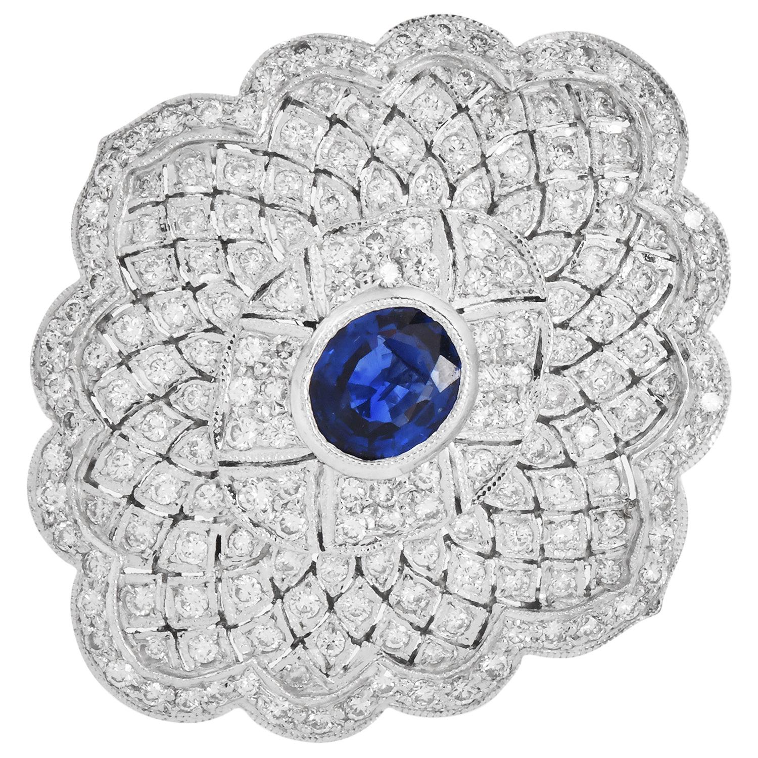These stunning 1980s floral cocktail earrings are crafted in 18K white gold, and feature an elegant symmetrical lace design with scalloped edges.

 earrings are adorned with two Genuine blue oval sapphires, totaling 3.00 carats, bezel-set at the