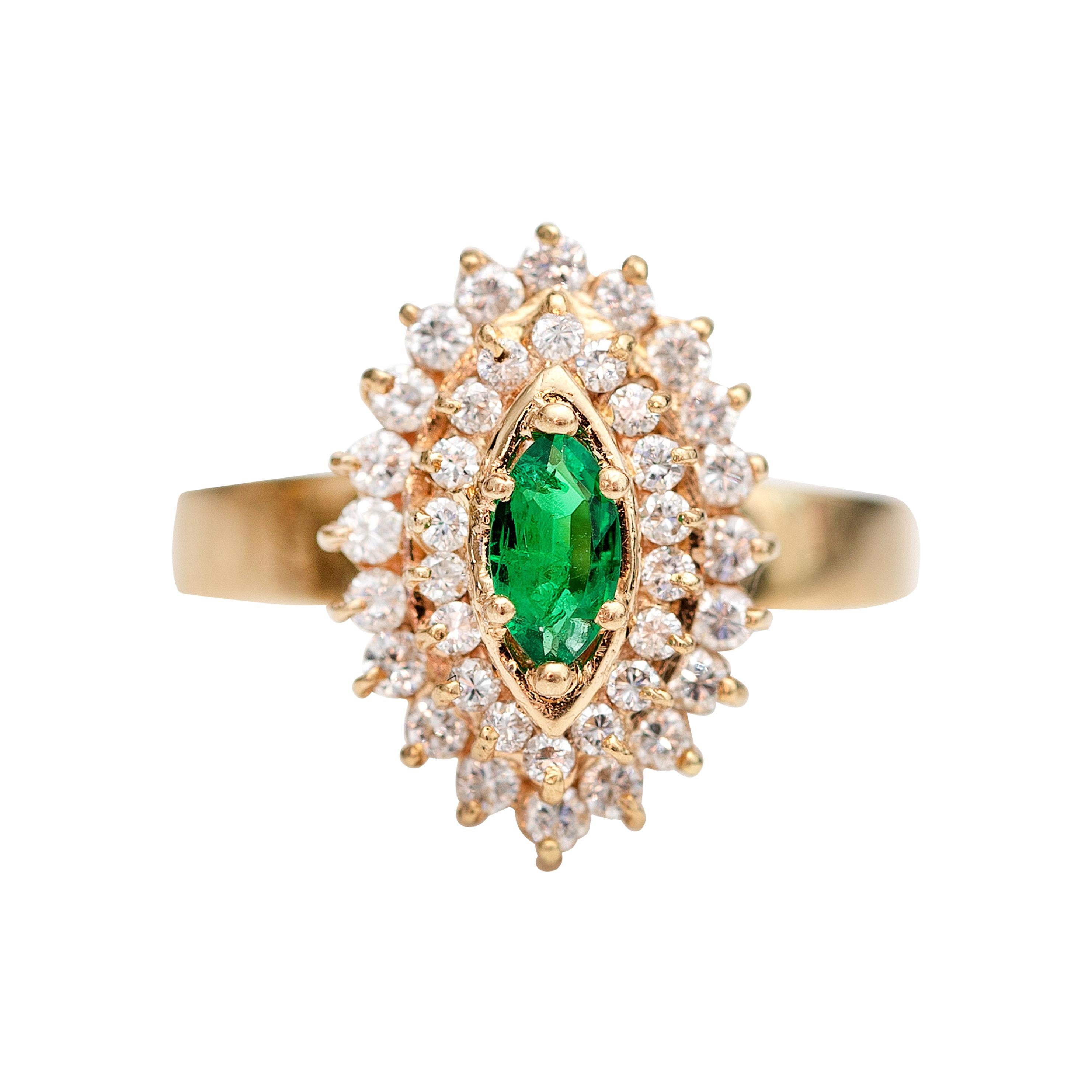 1980s Diamond and Emerald 18 Karat Yellow Gold Ring For Sale