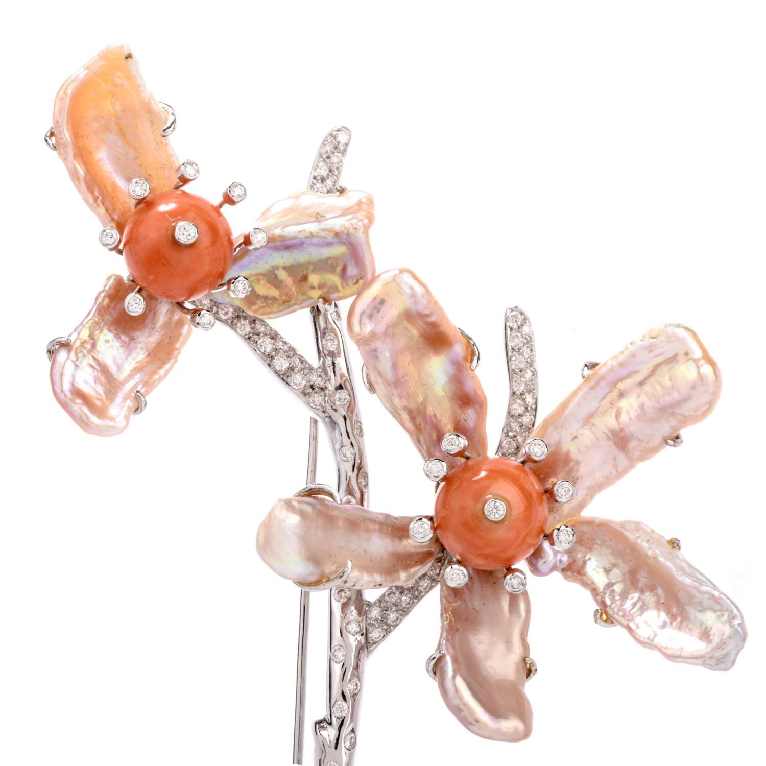 This large Love me Not Floral brooch pin was crafted in 

40.7 grams of luxurious 18K white gold.

Adorning the cetner of each of the 2 flowers are single beads of

red coral measuring appx. 11mm each.

The centers are nestled into the 8