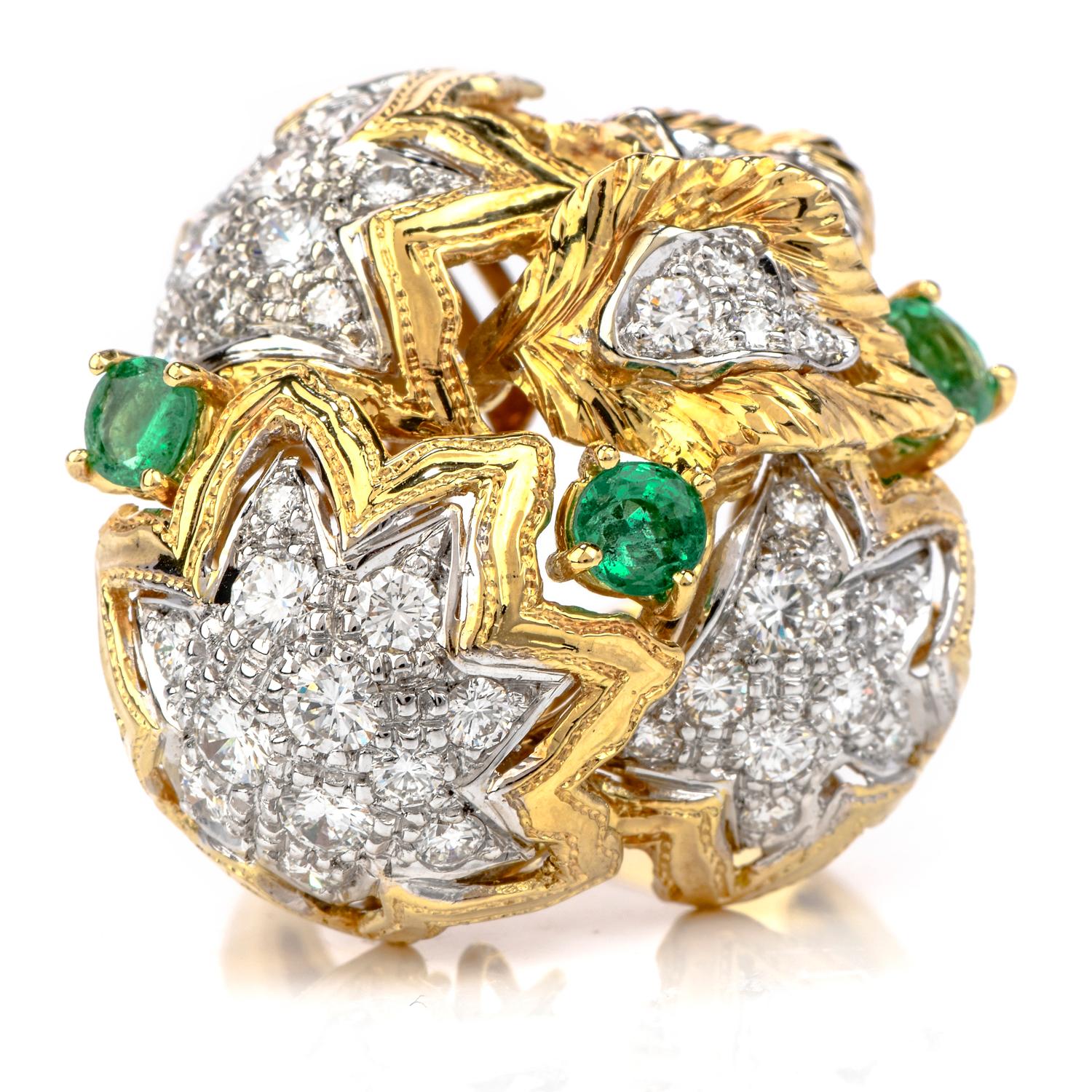 Every person needs a fun and noticeable cocktail ring in their collection.  This 1980's Diamond Emerald 18K Gold Large Star Cocktail Ring would be that perfectly beautiful addition!  
This bursting ring has star motifs and is crafted in 18 karat
