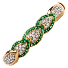 1980s Diamond Emerald 18 Karat Gold Leaf Bangle Bracelet