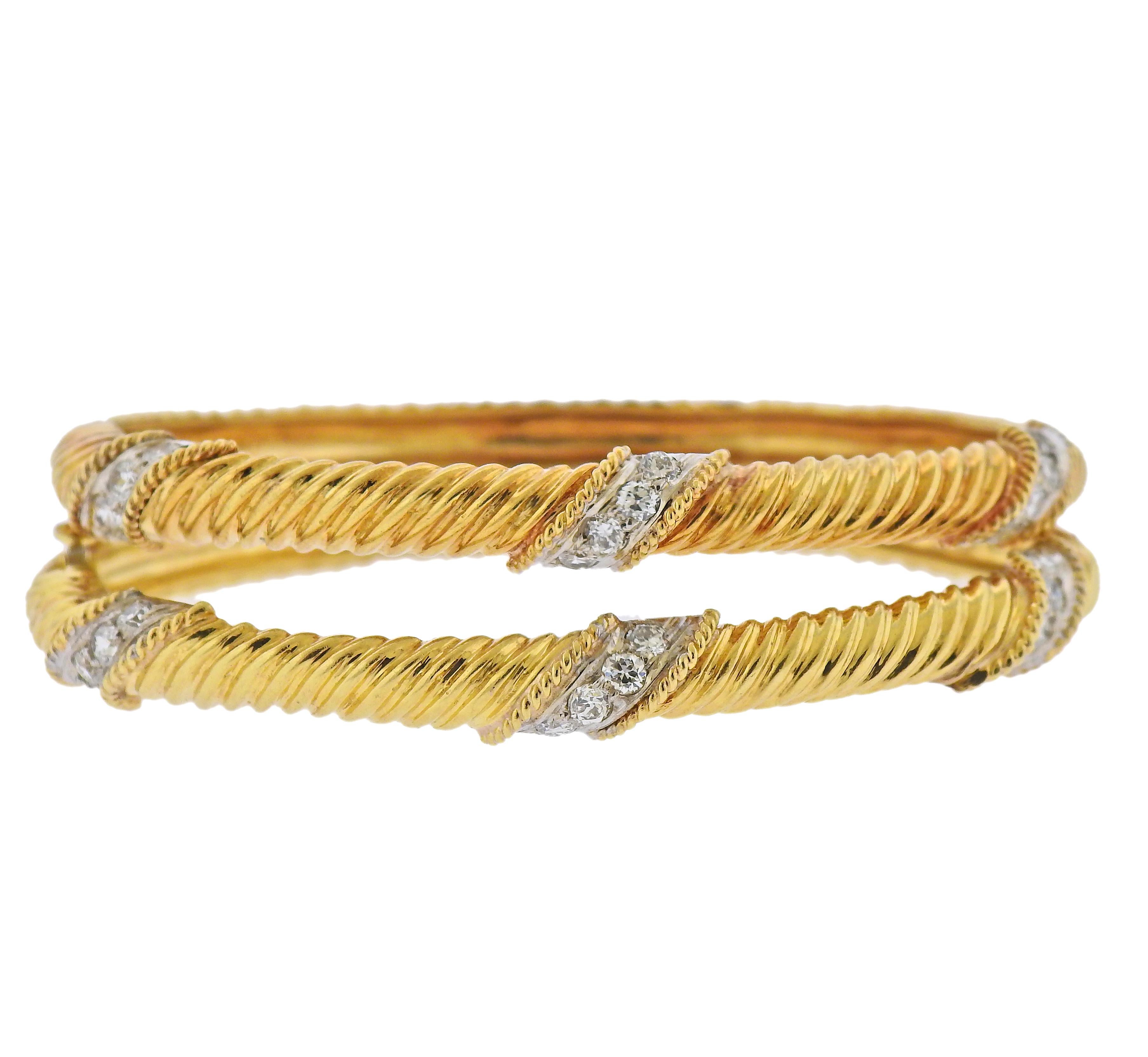 Set of two 14k gold vintage bracelets with a total of approx. 1.50ctw in diamonds. Bracelets will fit approx. 6.75