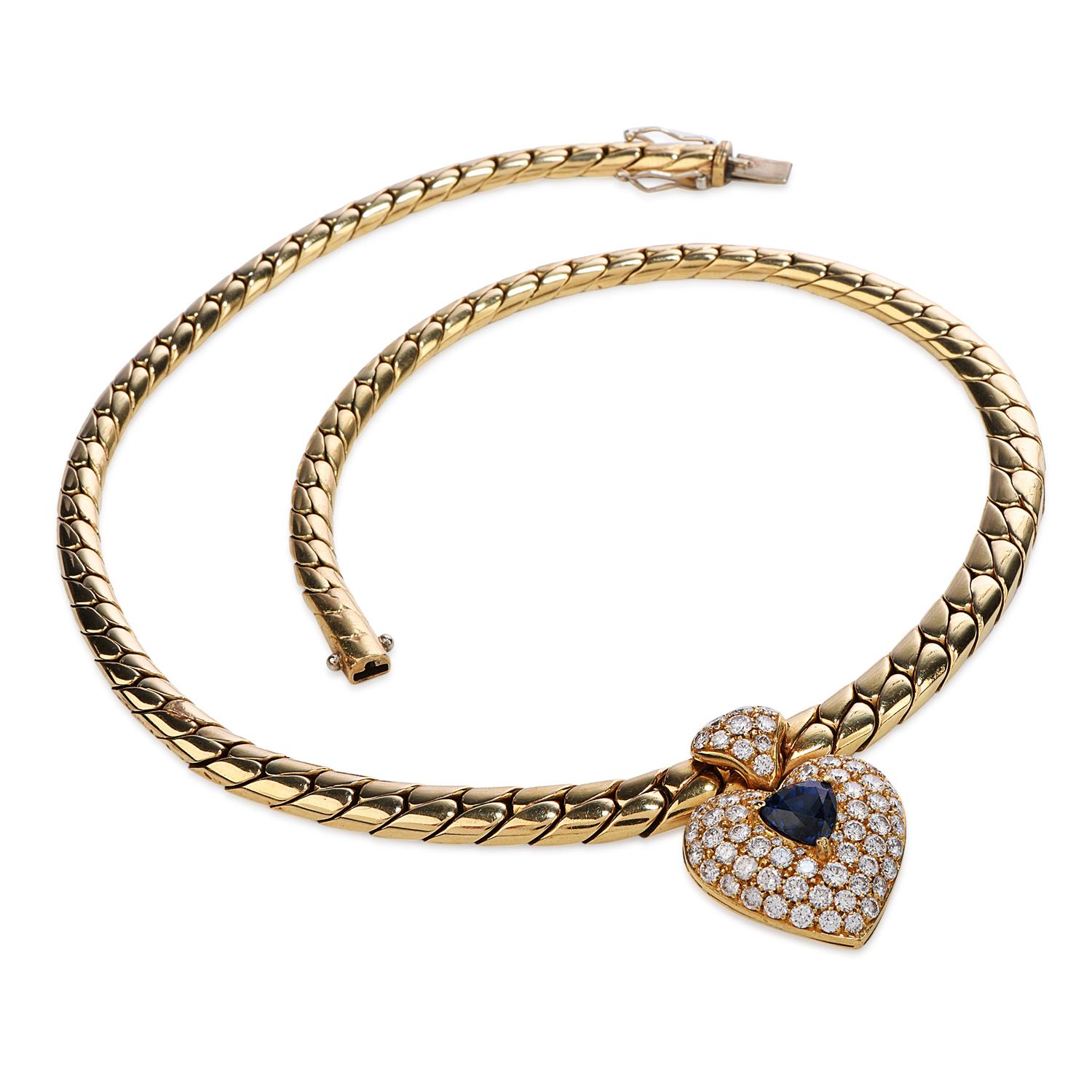 1980s Diamond Heart Blue Sapphire Pendant Heavy 18 Karat Gold Link Necklace In Excellent Condition In Miami, FL