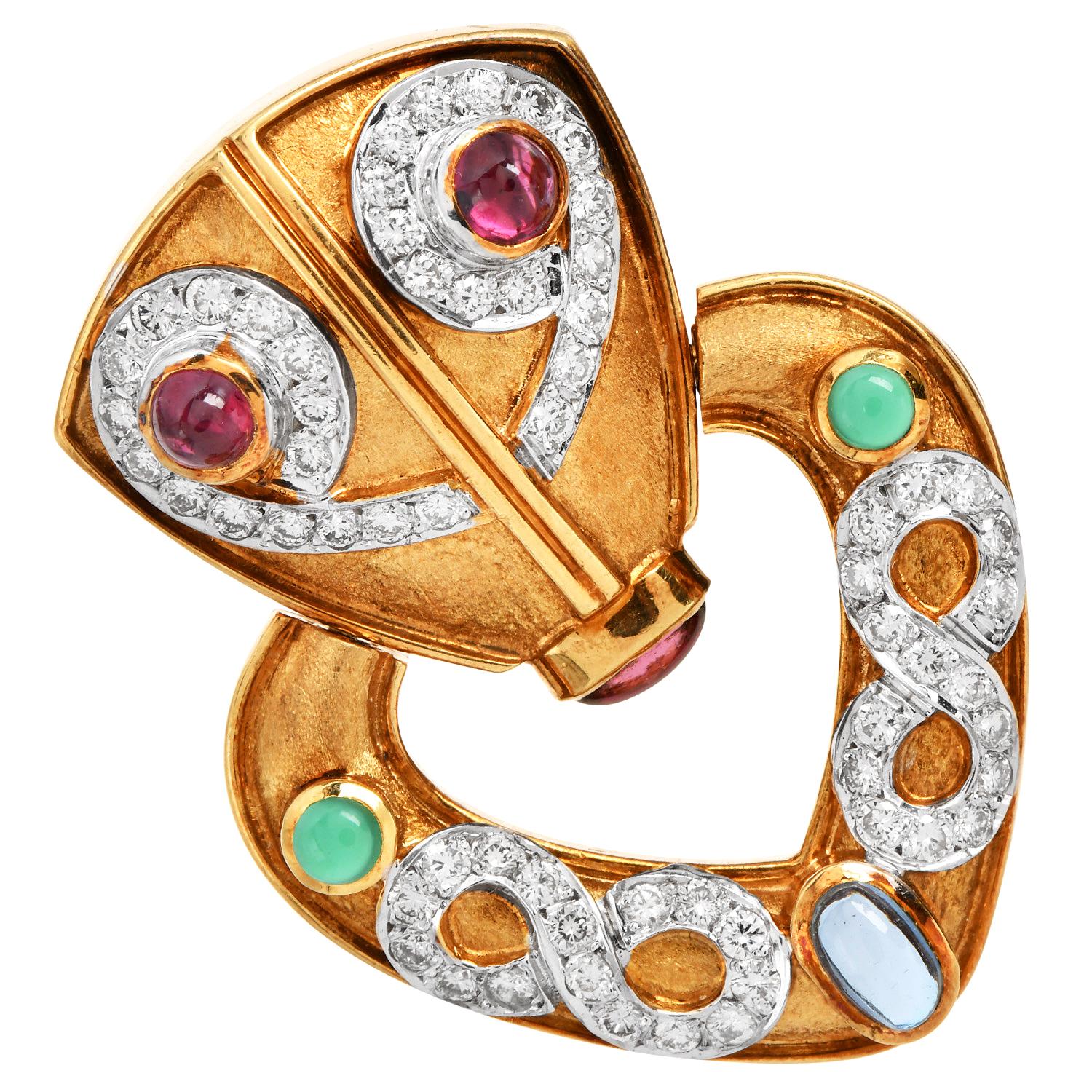 1980s 18K Yellow Gold Doorknocker Clip-On Statement Earrings with Diamonds and Gemstones.

These luxurious large Doorknocker-style clip-on earrings are crafted in 18K yellow gold with a subtle satin finish.

The bold design is adorned with an array