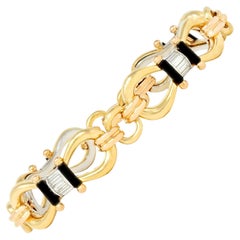 1980
s Diamond Onyx 18 Karat Tri-Colored Gold Vintage Horsebit Bracelet