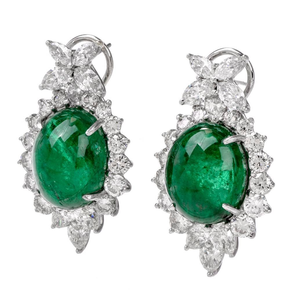 These aesthetically ' High Jewellry ' earrings of meticulous craftsmanship are rendered in 18k Gold . These classically fascinating earrings expose a pair of GIA certified natural beryl emerald oval cabochons weighing approx. 36.06 carats in