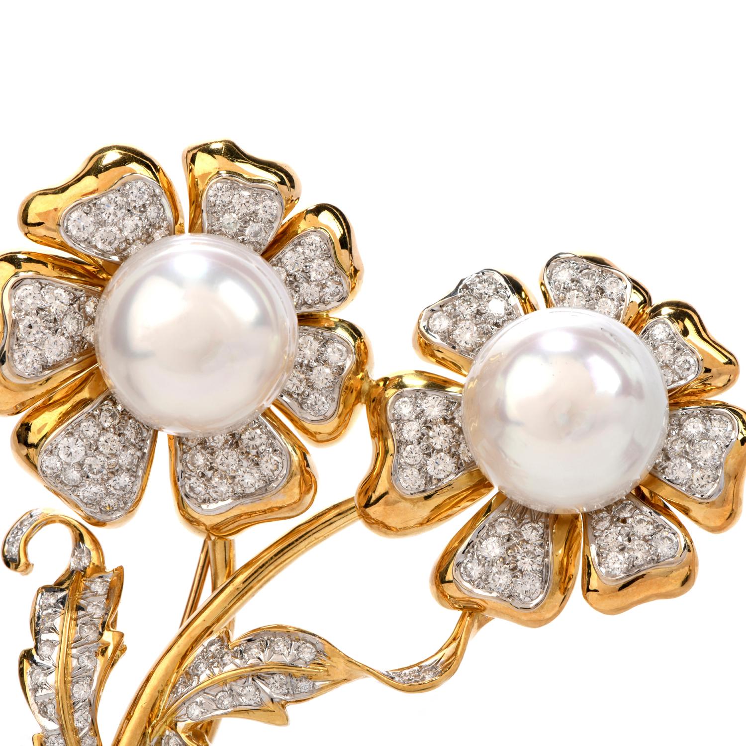 Adore this prominent and beautiful Estate Diamond Pearl 18K Gold Double Flower Pin Brooch!  This pin/brooch is crafted in 18 karat yellow and white gold.  There are two large, 16 millimeter genuine pearls with minor blemishes, that represent the