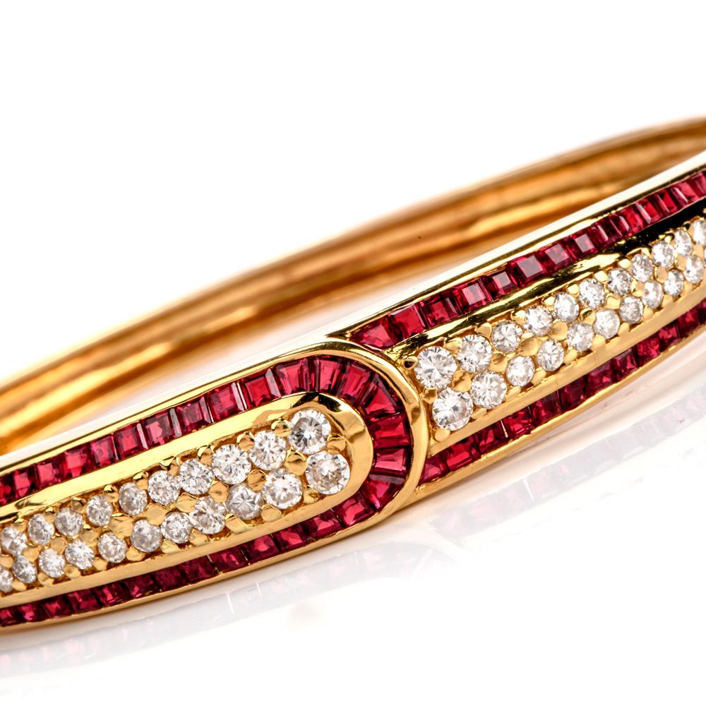 This elegant  colorful 1980's  Estate Diamond & Ruby bangle bracelet set with high quality gems secures with an insert clasp is crafted in 18K yellow gold.

Material: 18K yellow gold

Weight: 32.23 grams

Dimensions: 65mm x 11mm

Wrist Size: