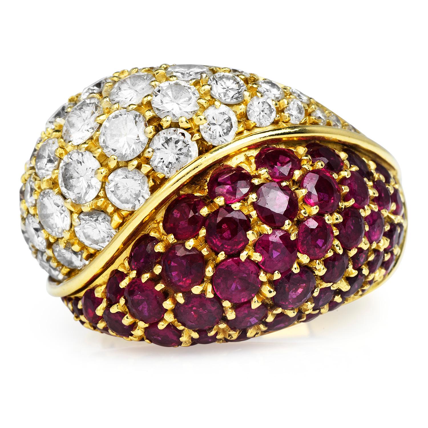 This estate circa 1980's cocktail ring is italian made in solid 18K yellow gold with an assemblage in a cluster bypass desing of genuine rubies and diamonds.

The center, round cut 48 genuine diamonds weigh approx. 5.00 carats. H-I  color, clarity.